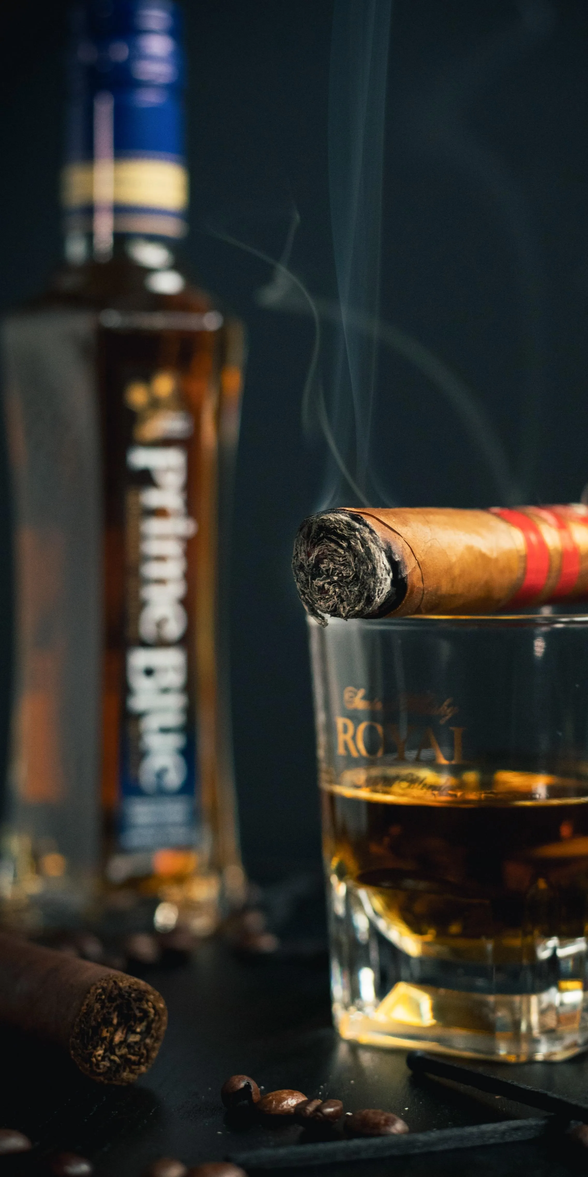 Premium Cigar and Whiskey Glass on Dark Elegant Background