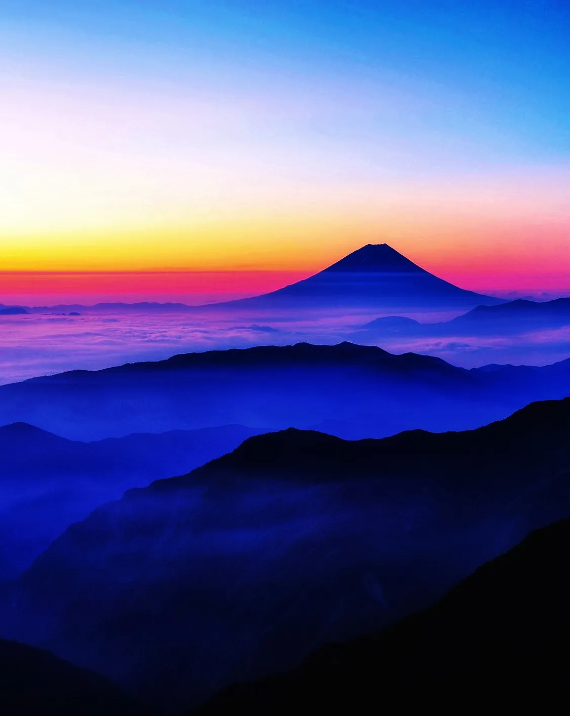 Purple and Pink Mountains under Morning Sky Layers