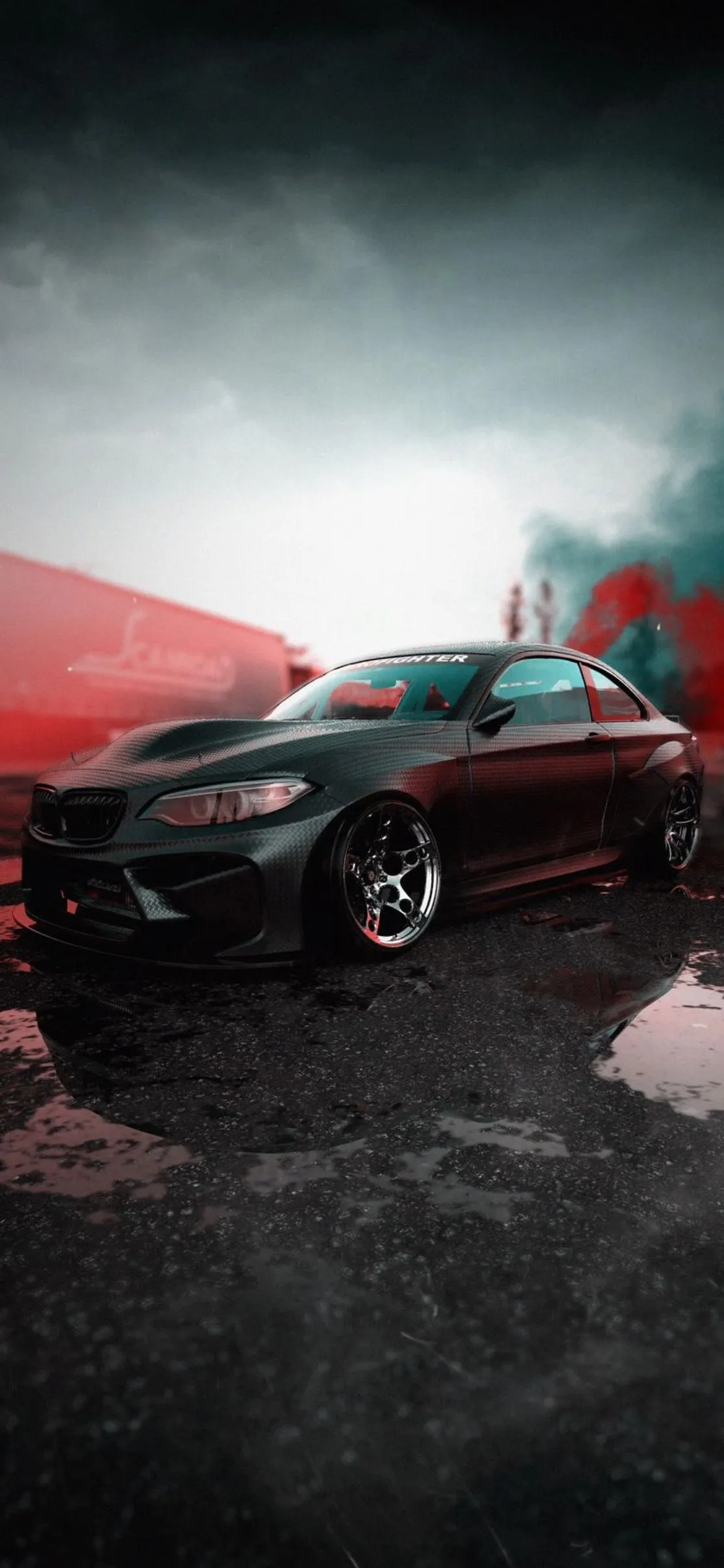 Rainy Evening with Muscle Cars in Urban Backdrop Wallpaper