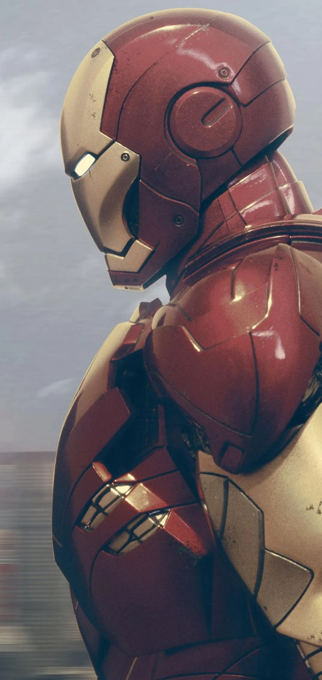 Red Armored Hero Suit Displayed in Dramatic Lighting
