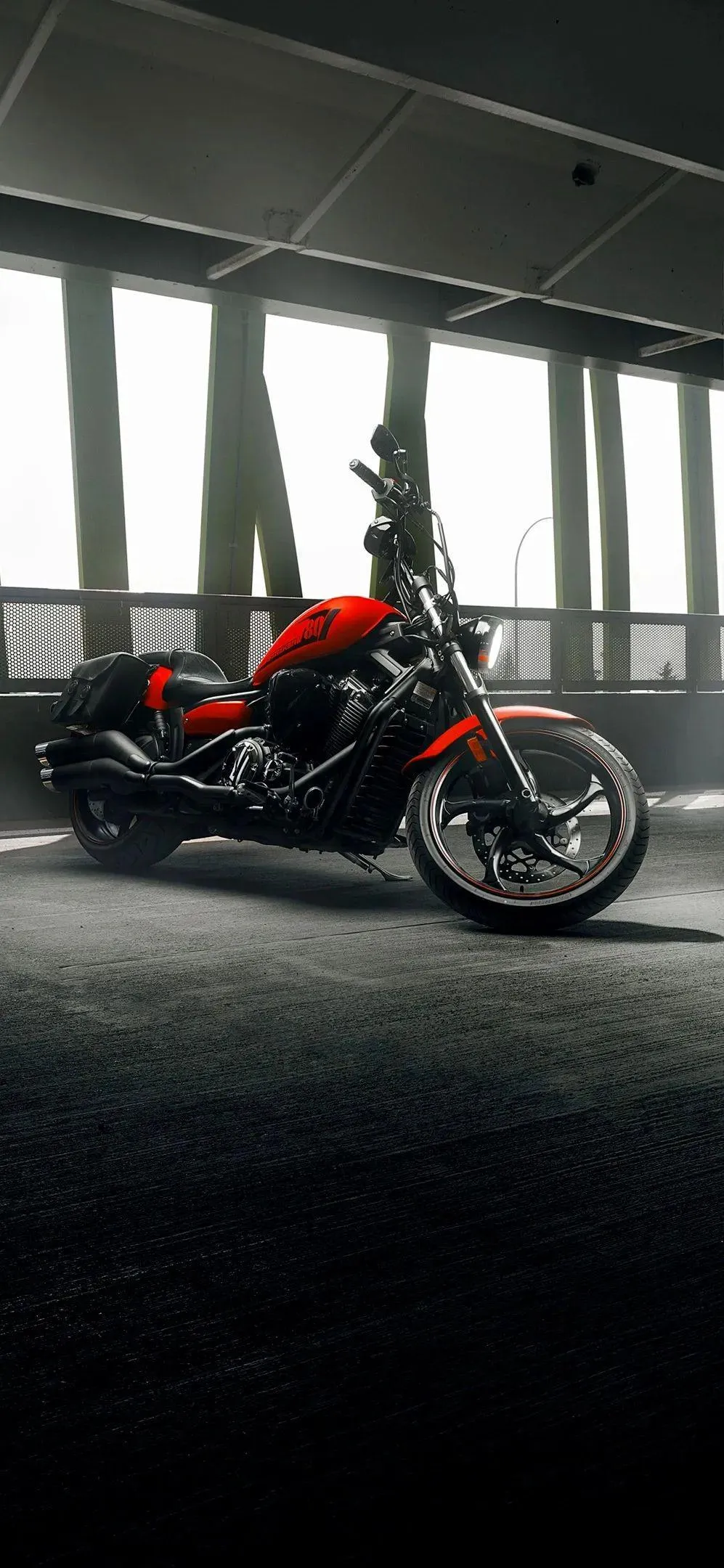 Red Motorcycle in Urban Showroom for Speed Lovers Wallpaper