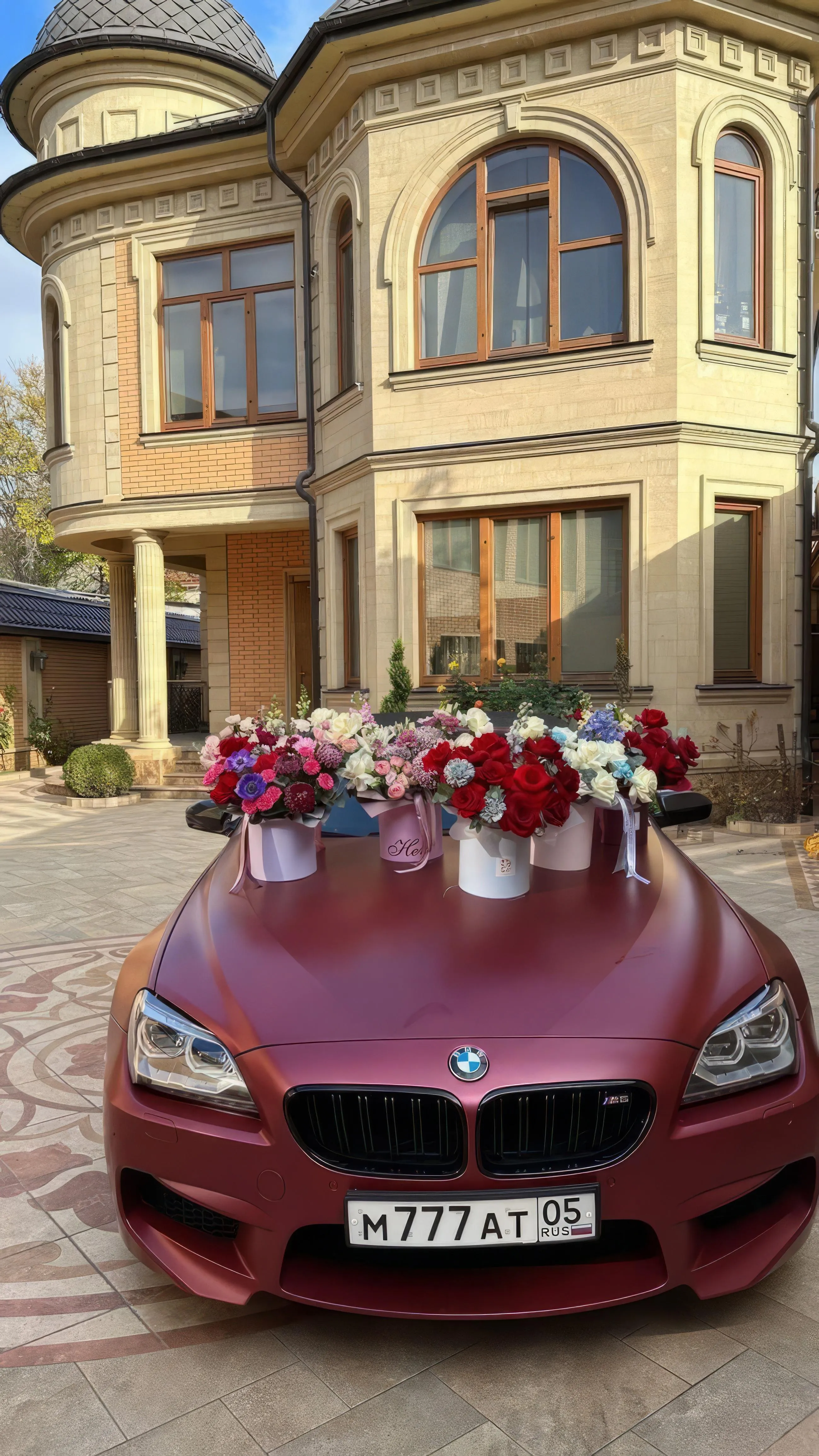Red Sports Car Decorated for Festive Holiday Celebration