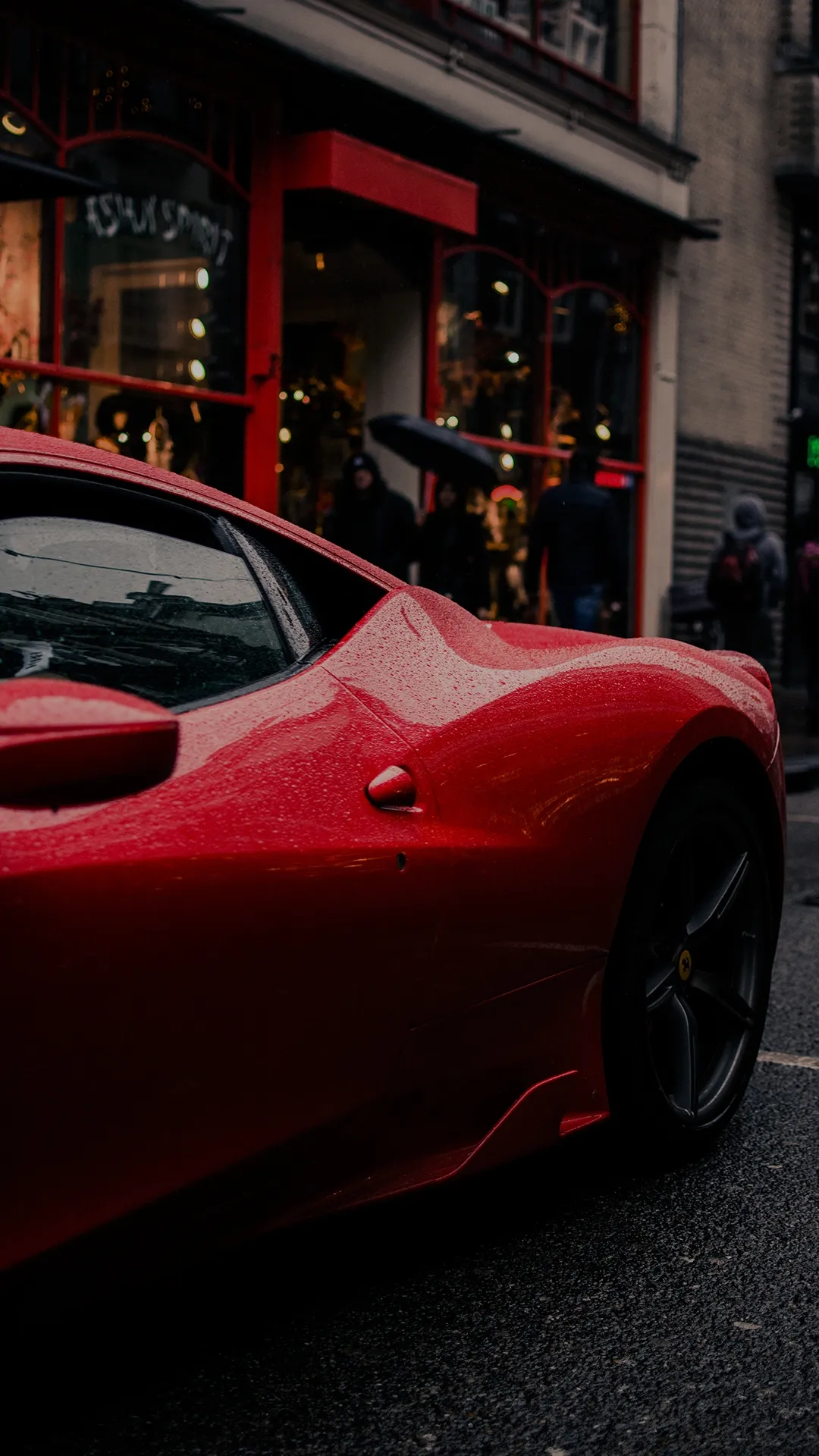 Red Sports Car Parked in an Urban City Street Setting