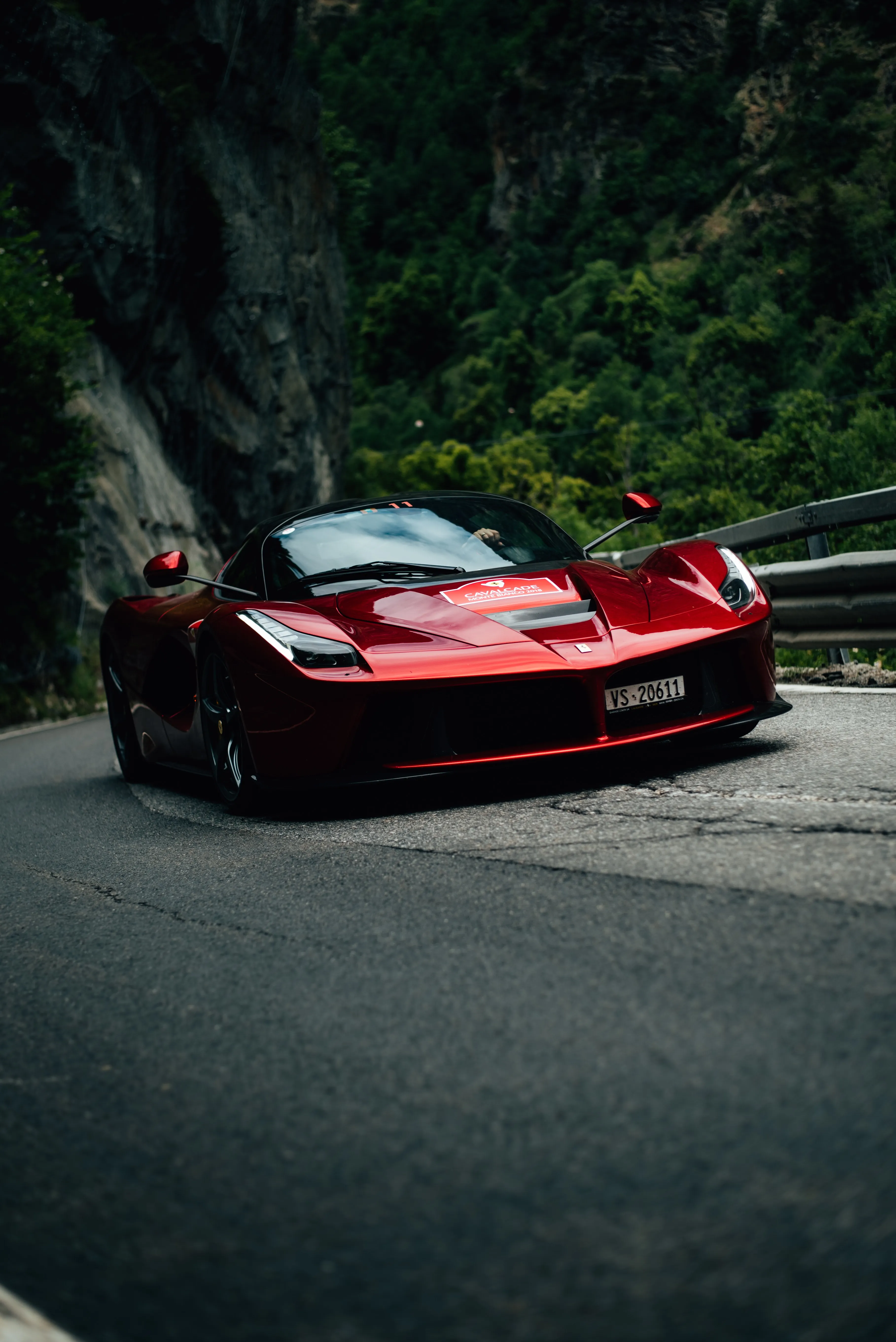 Red Sports Car Parked on Green Forest Road Wallpaper