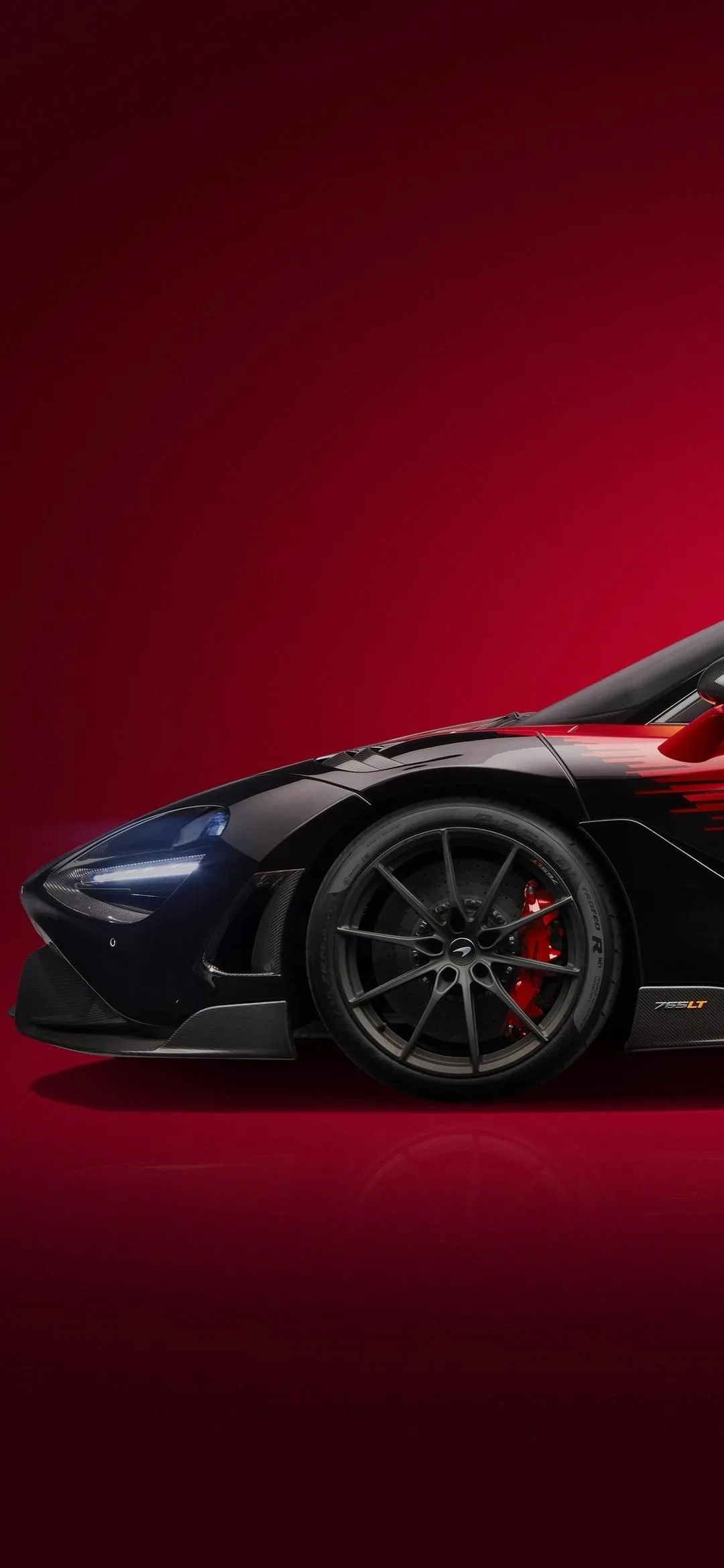 Red Sports Car Speed Shot with Shiny Detailing Wallpaper