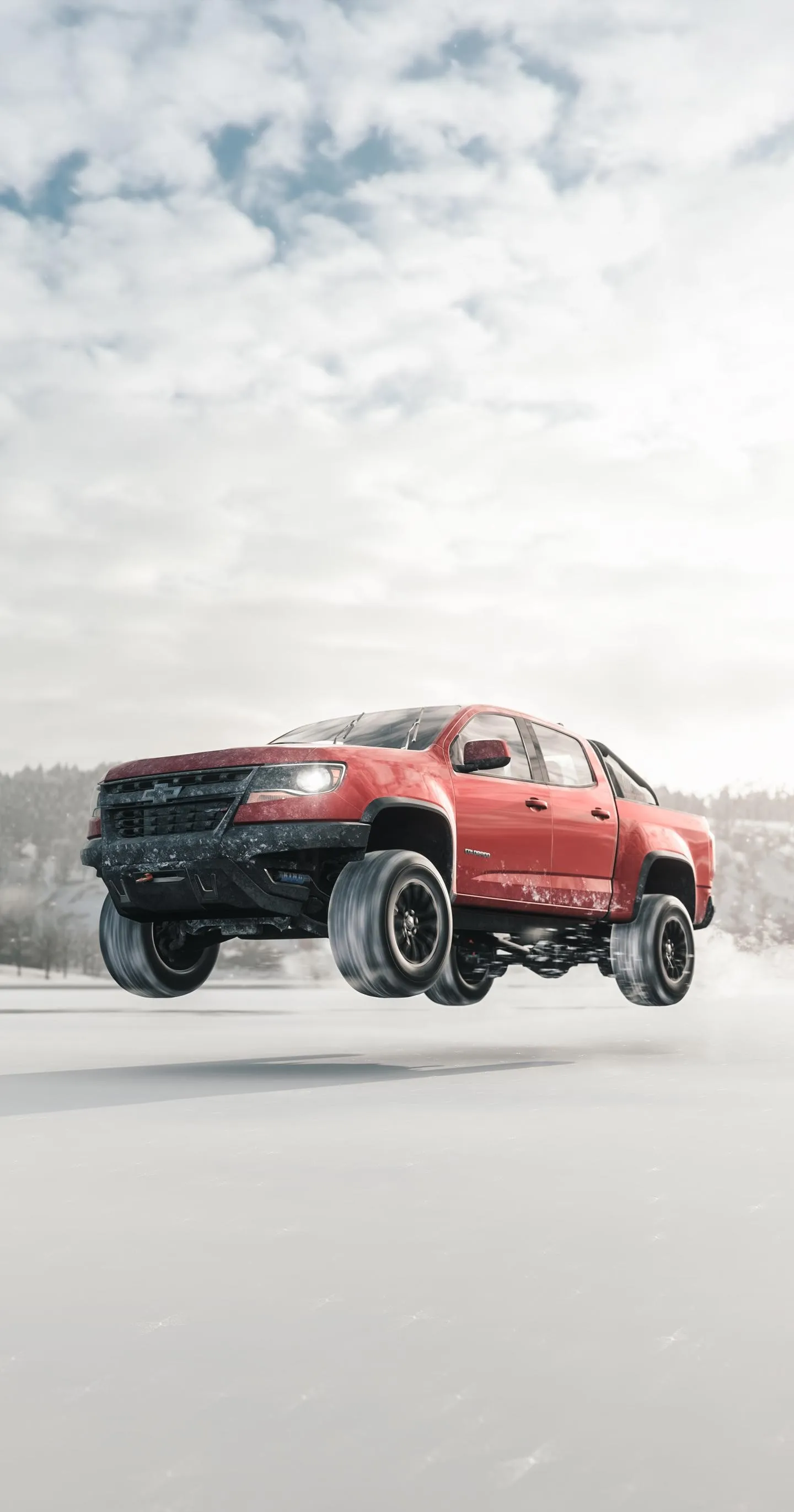 Red SUV Driving Through Snowy Mountain Road Wallpaper