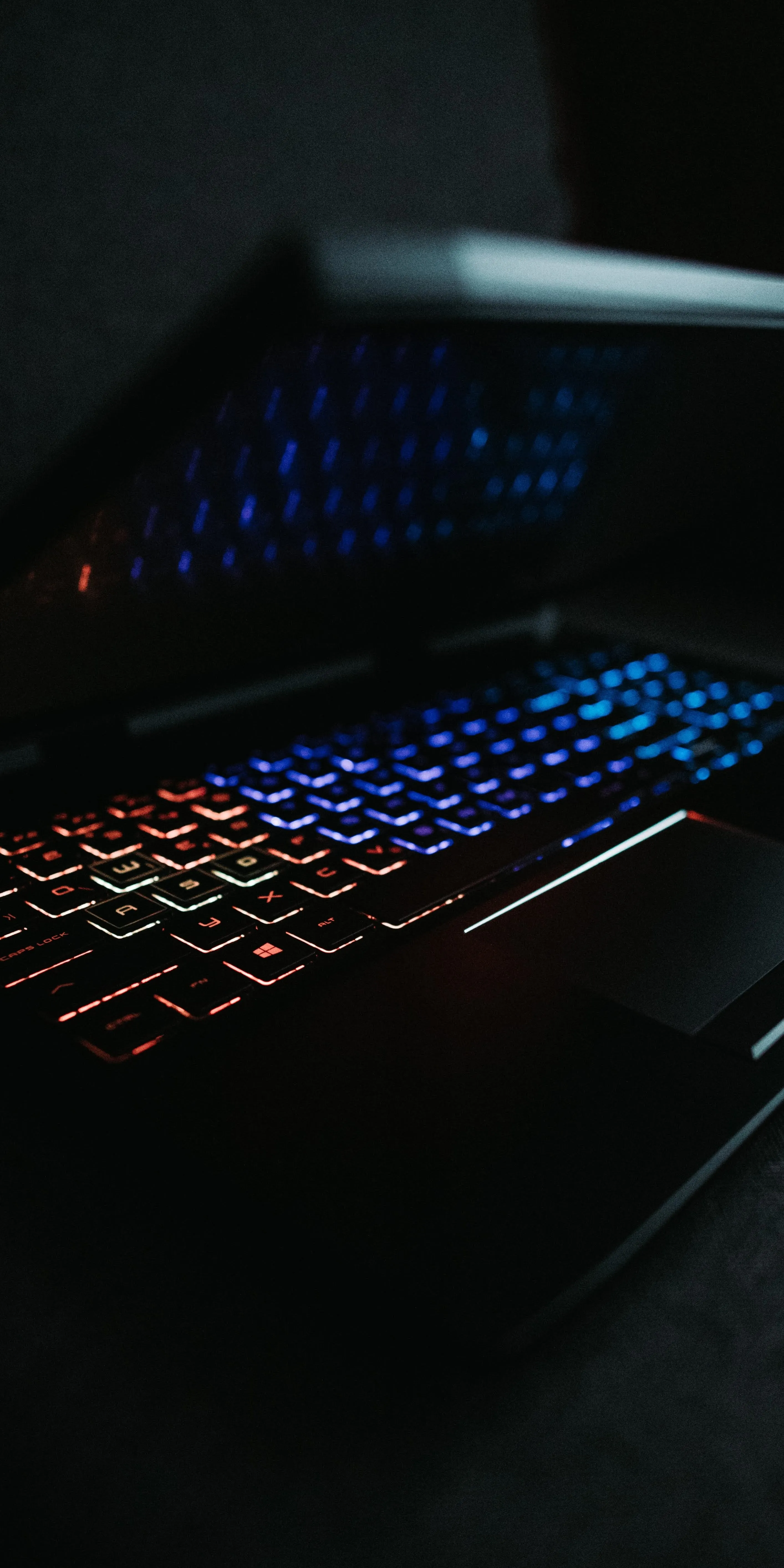 Rgb Light on Keyboard in Dark Gaming Setup Wallpaper