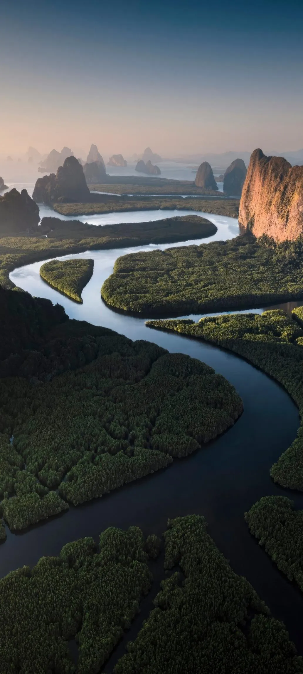 River Winding Through Canyon at Sunset Aerial View