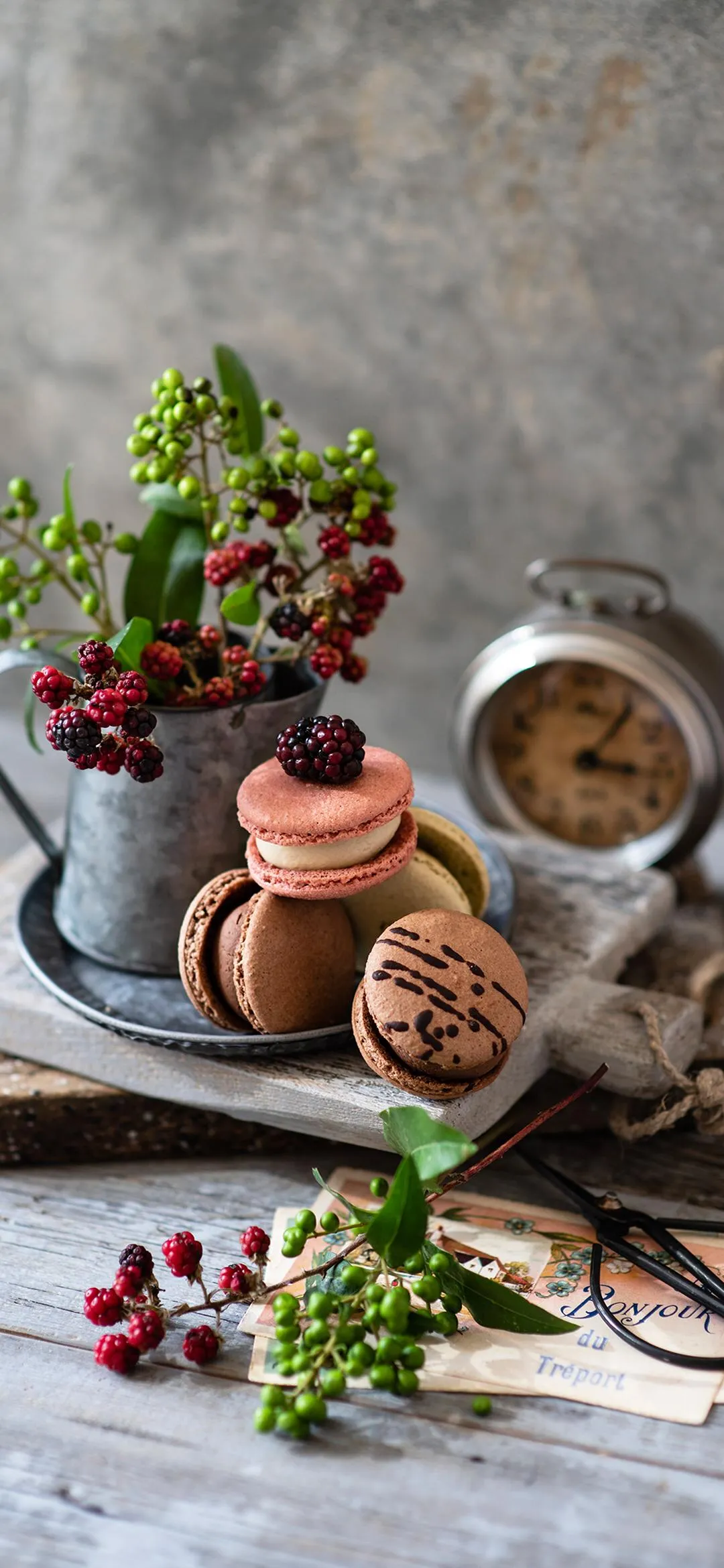 Rustic Macaron Display with Berries and Vintage Decor