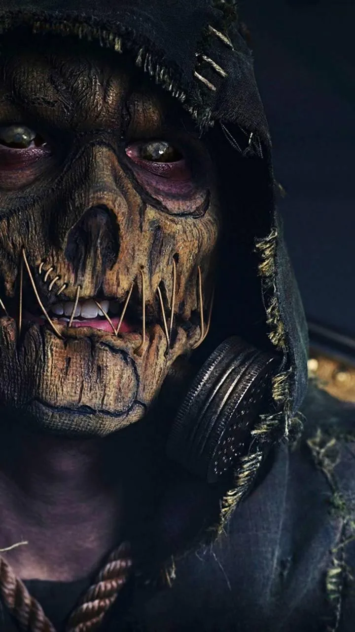 Scary Monster Mask with Dark Textured Background Wallpaper