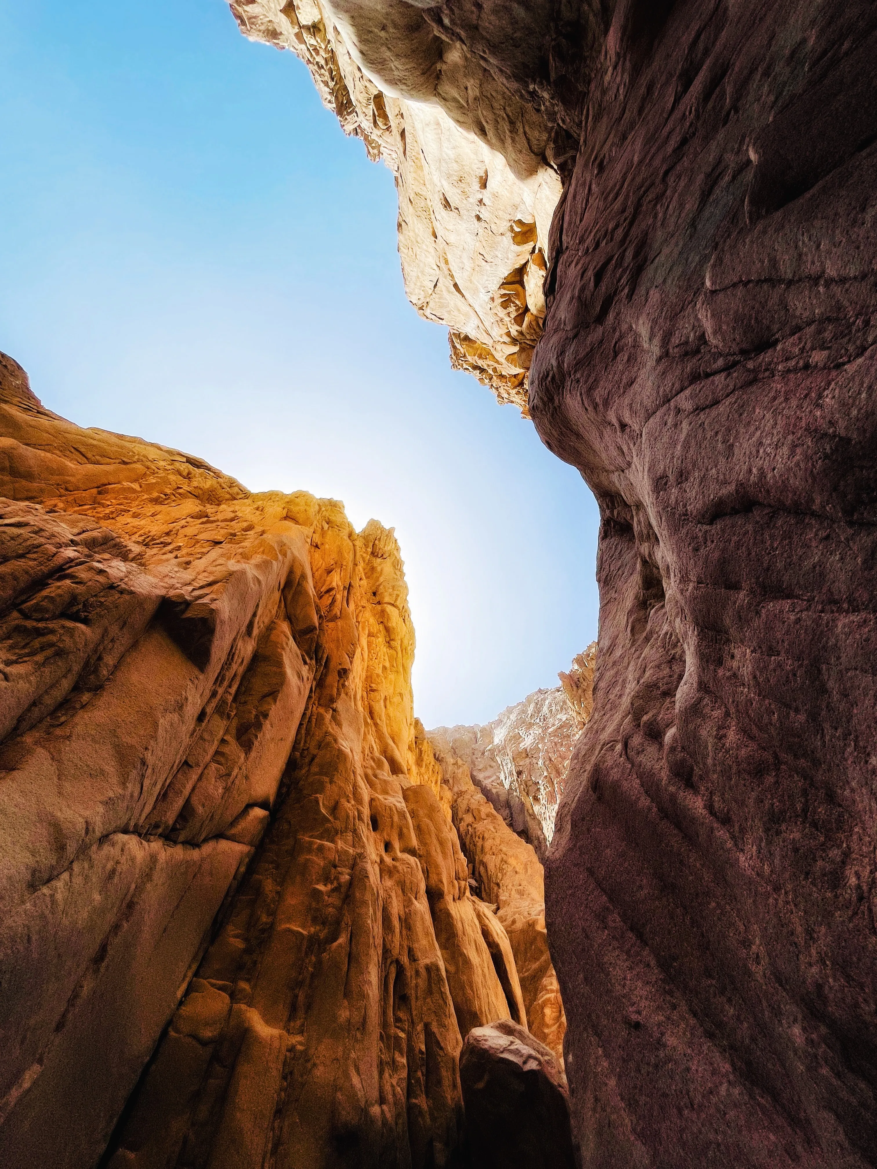 Scenic Canyon View with Blue Sky and Rocky Walls Wallpaper