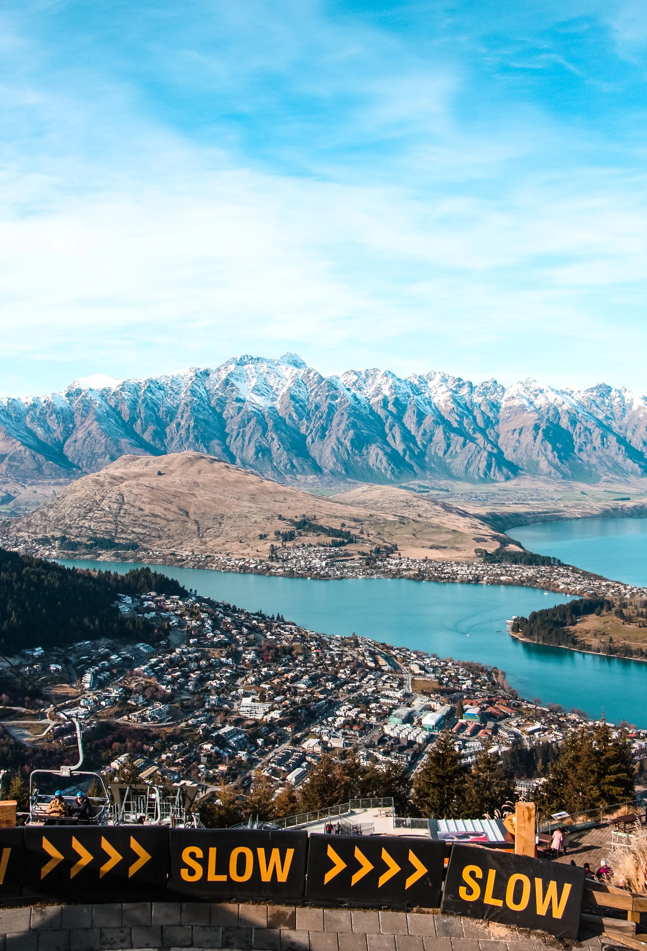 Scenic Mountain View with Lake and Road Markings Slow