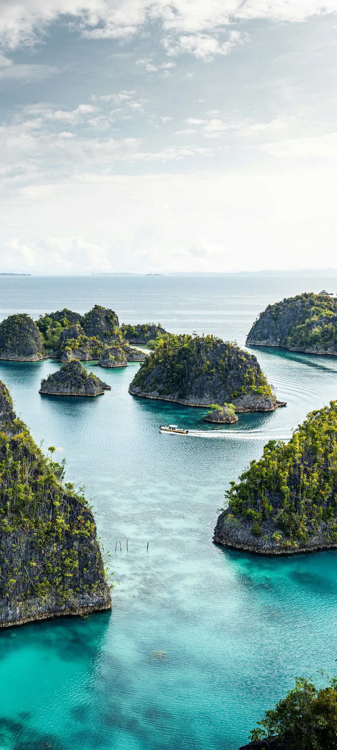 Scenic Rocky Island Landscape Surrounded by Clear Water