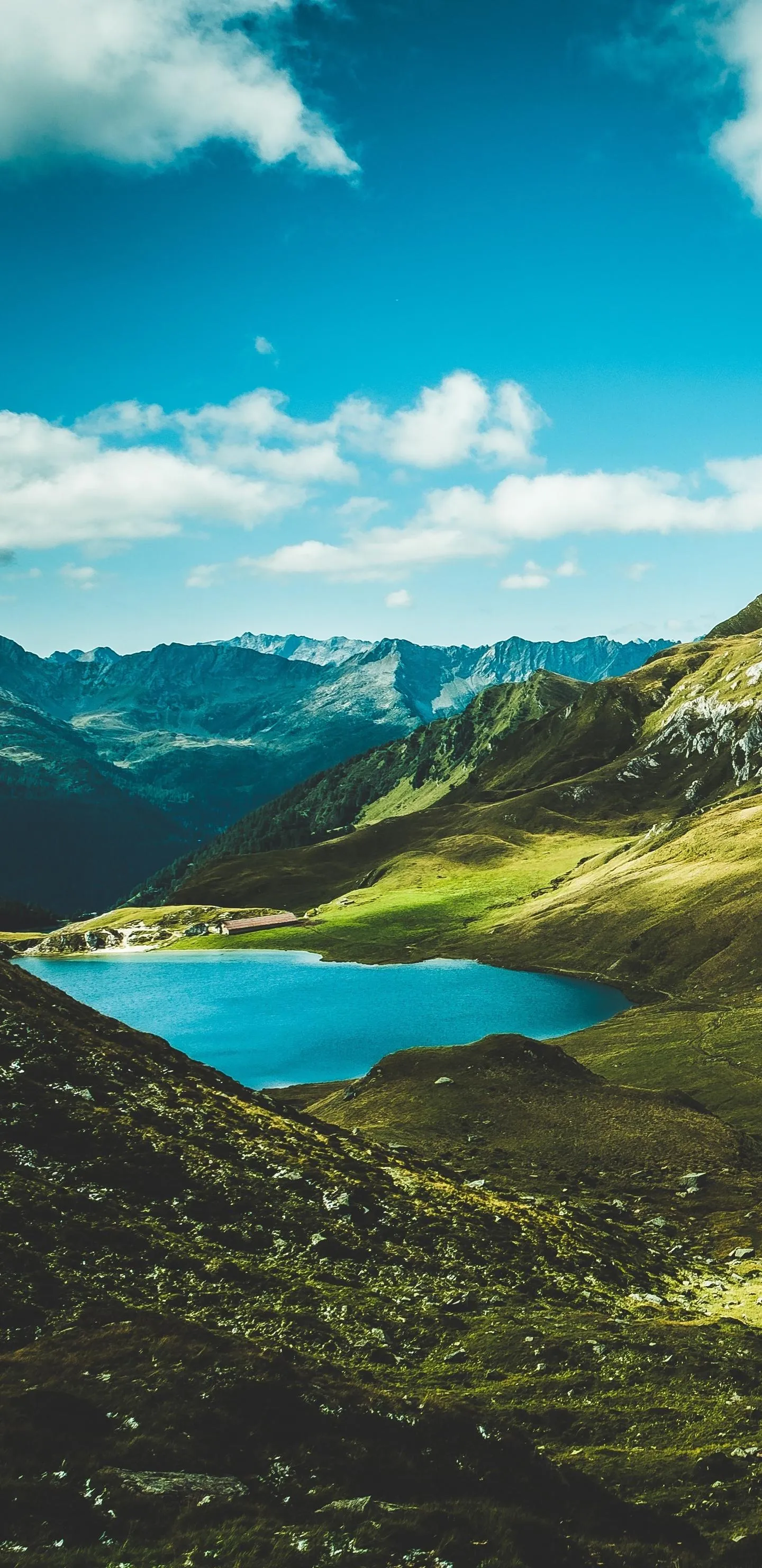 Scenic View of Mountain Lake with Clear Blue Waters