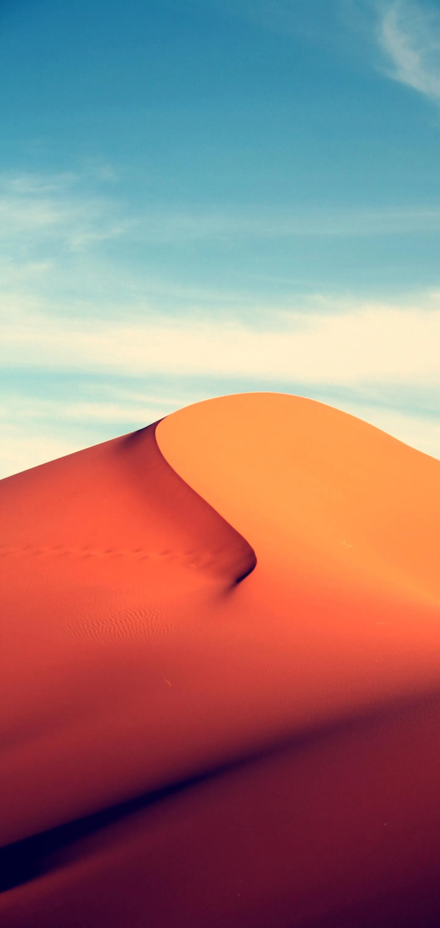 Serene Desert Dunes Under a Clear Blue Sky Wallpaper