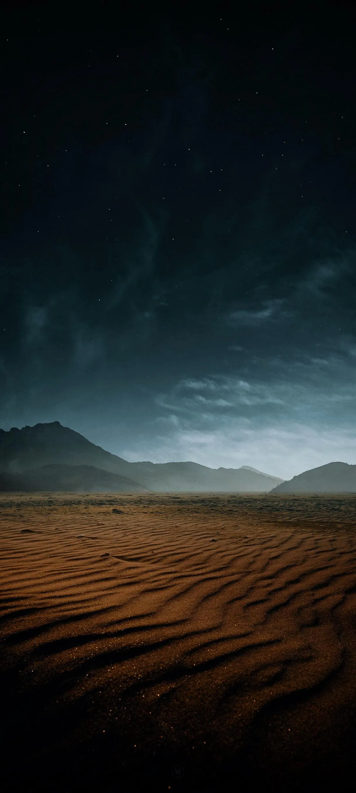 Serene Desert Landscape with Mountains Under Moody Sky