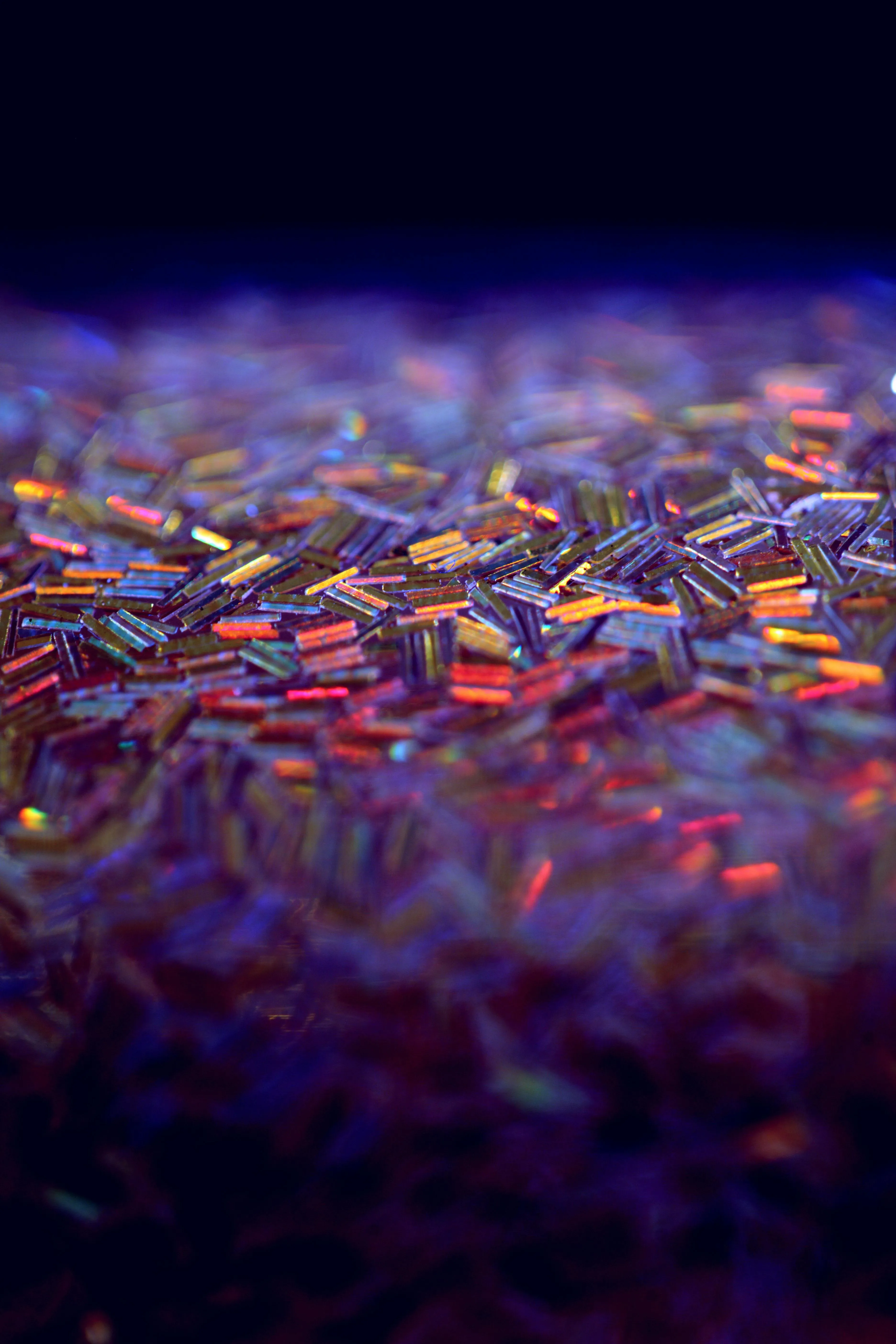 Shimmering Abstract Lights with Deep Purple Tones Wallpaper