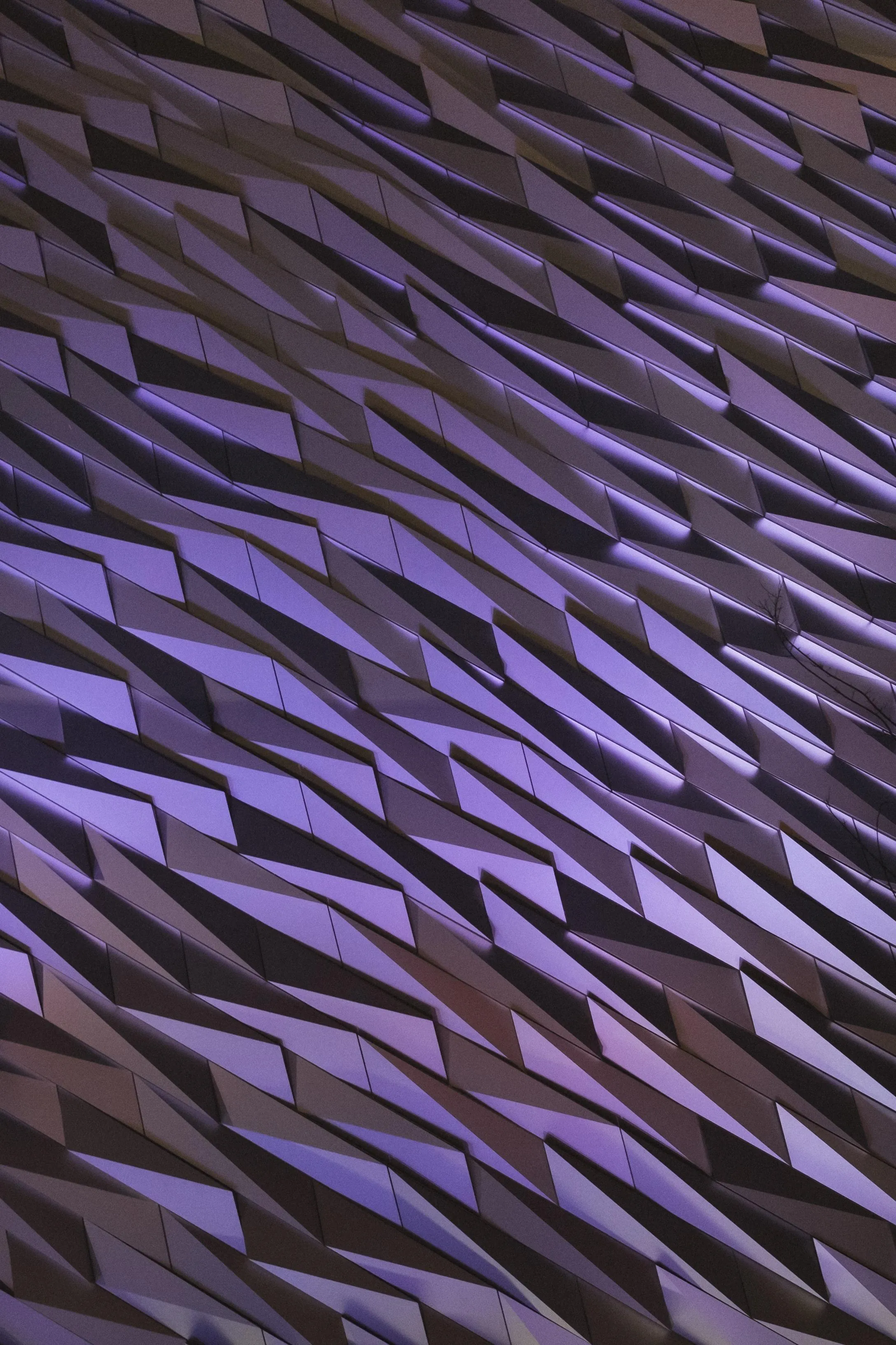 Shimmering Metal Pattern Reflecting Purple Light Tones