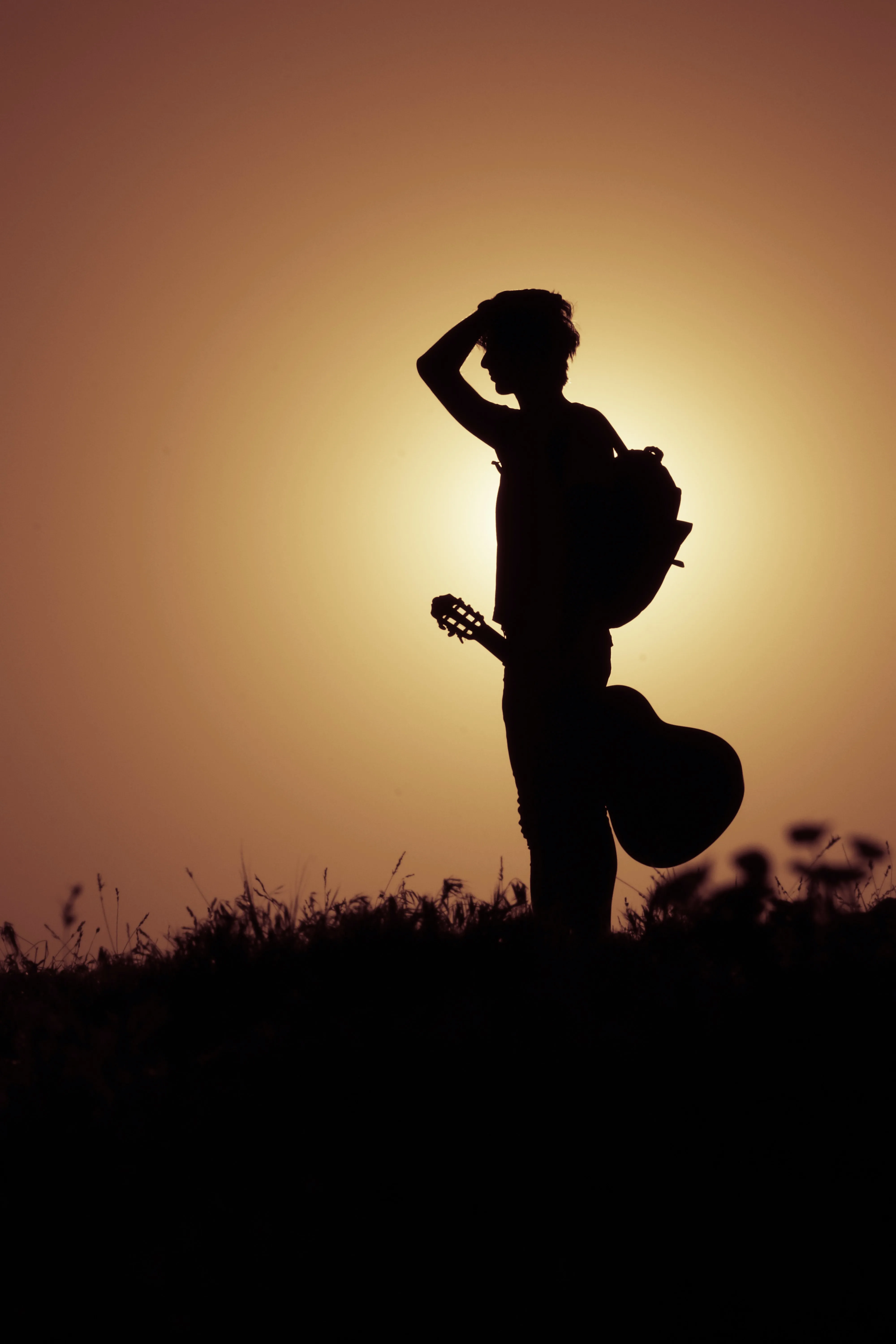 Silhouette of Young Man at Sunset Calm Nature View