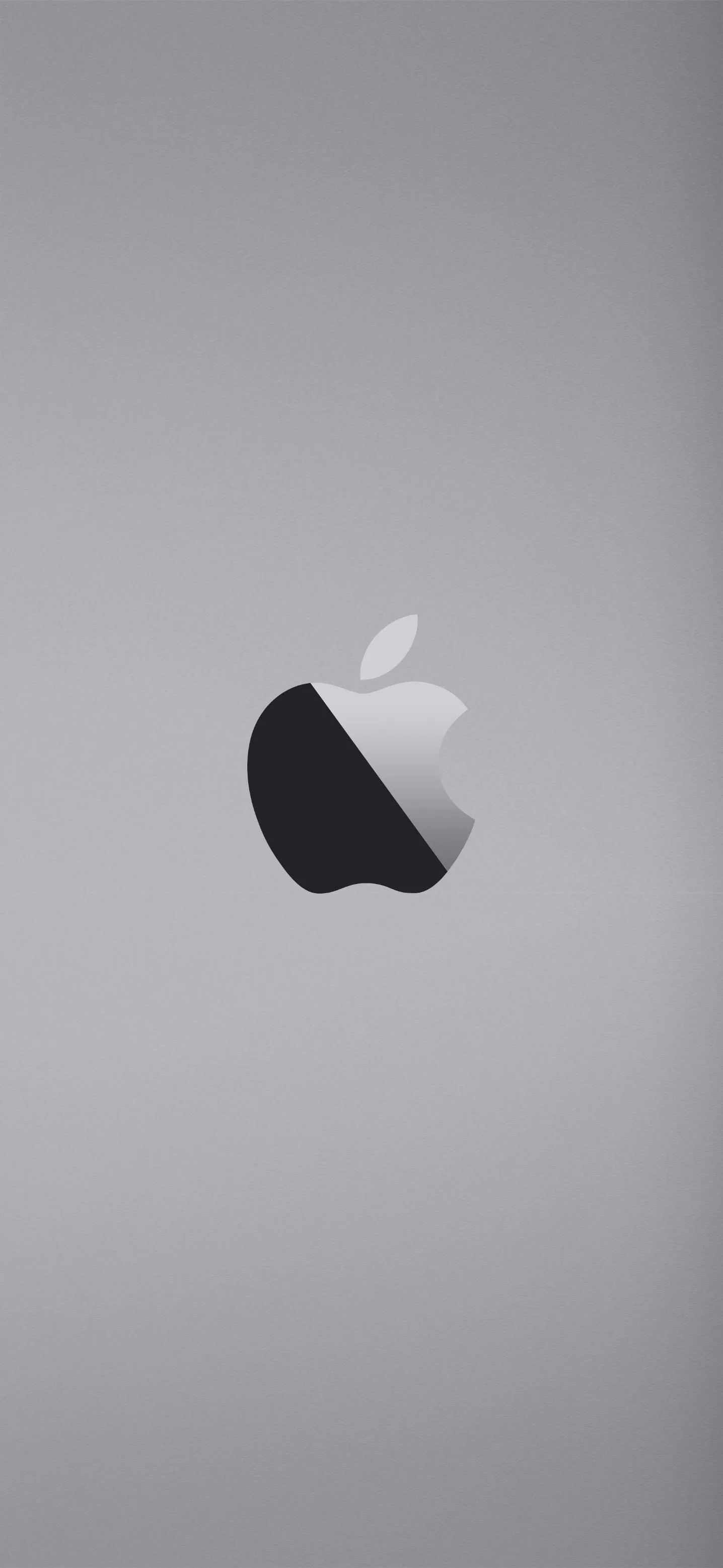 Silver Apple Logo on Sleek Grey Background for Minimal Design