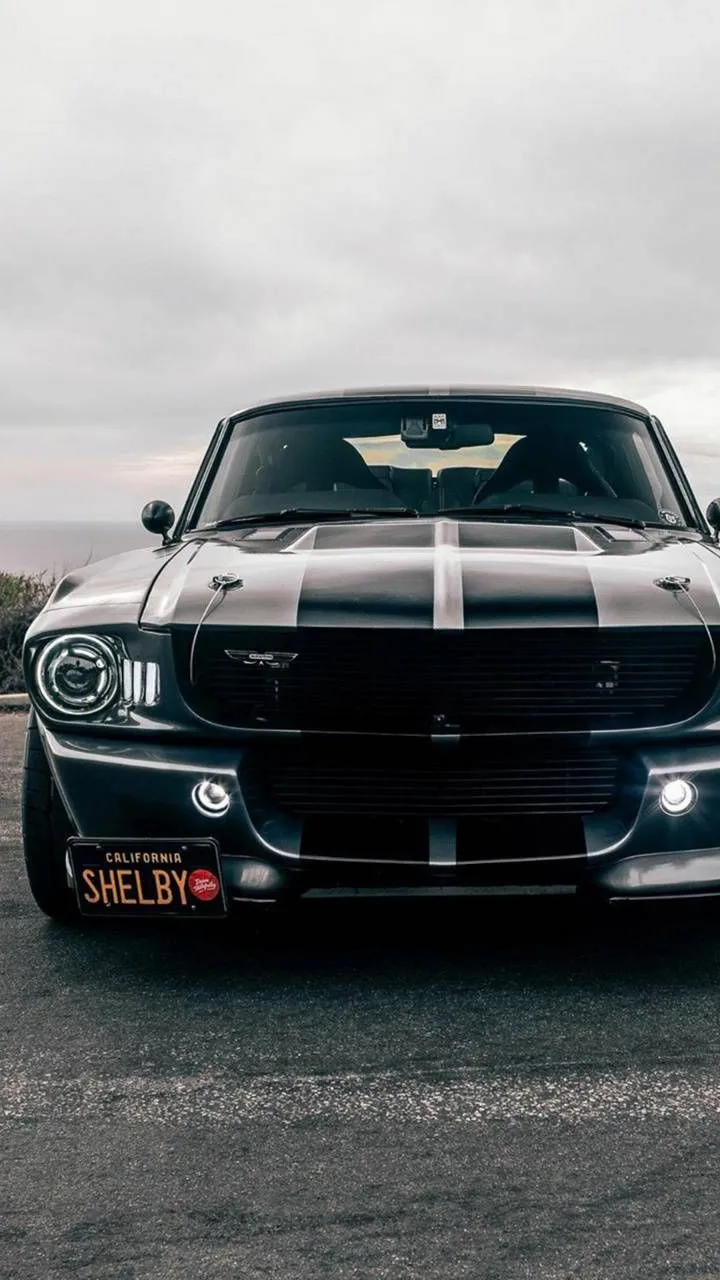 Silver Sports Car Parked on Road with Strong Cinematic Tone