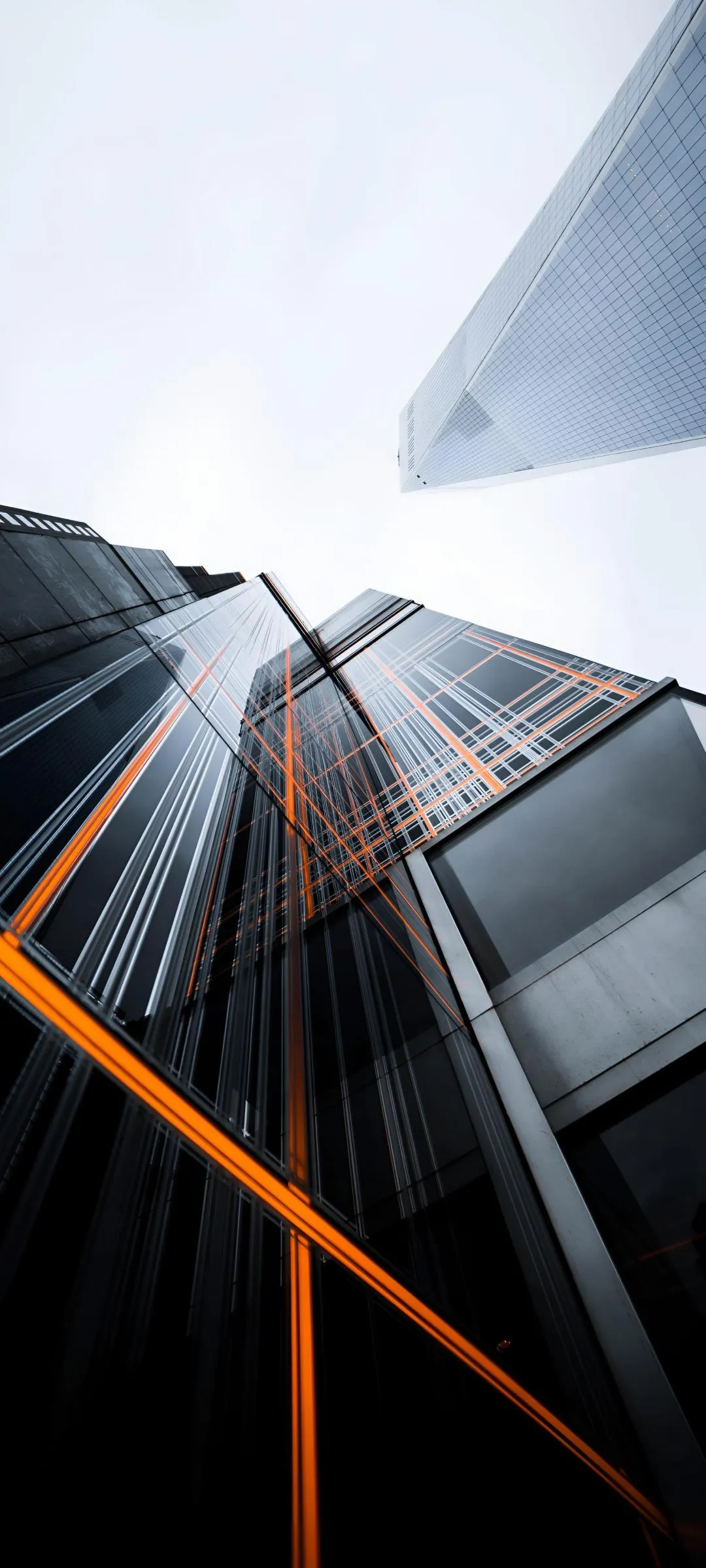 Skyscraper Perspective with Orange Light Reflection