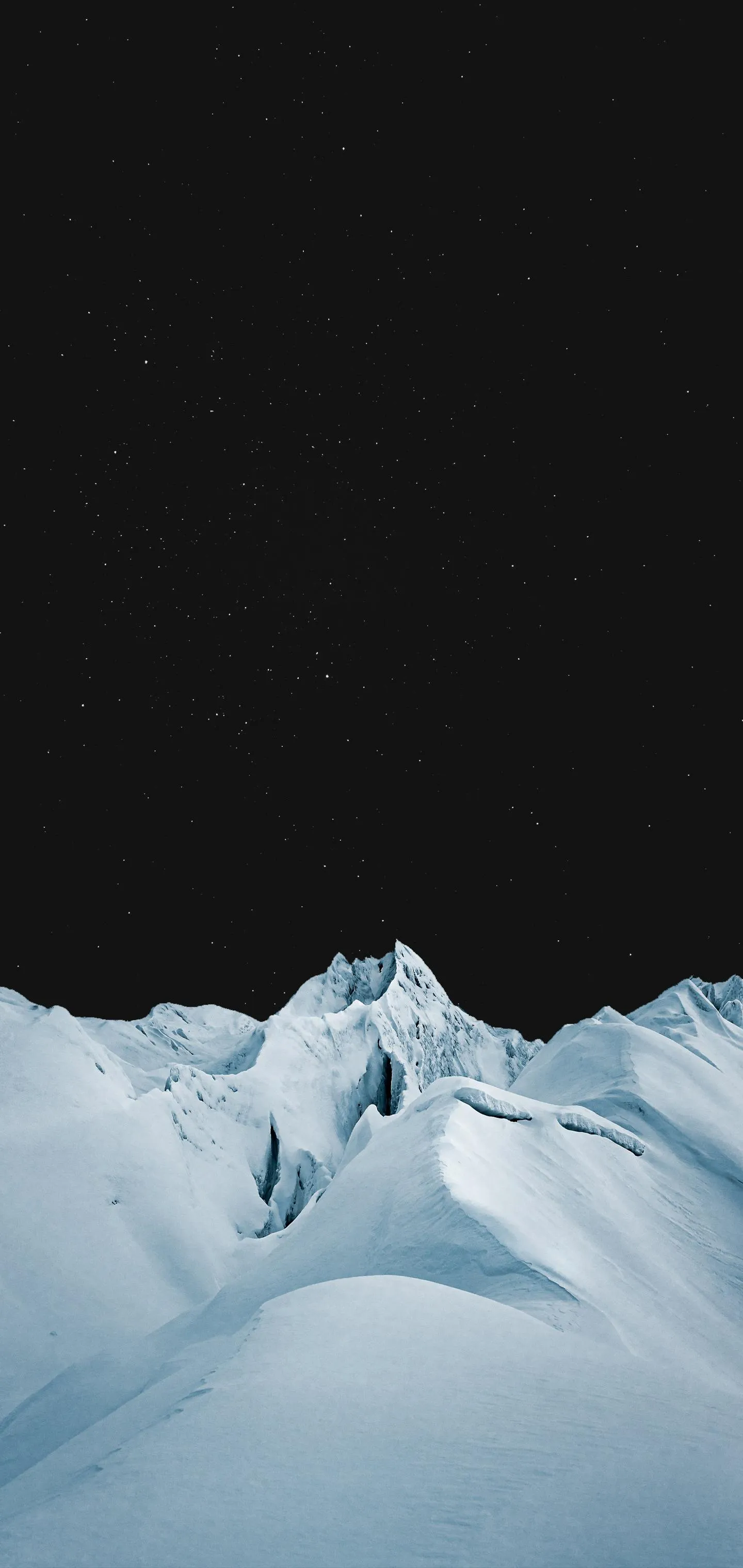 Snow Covered Mountains Under Pale Winter Sky Wallpaper