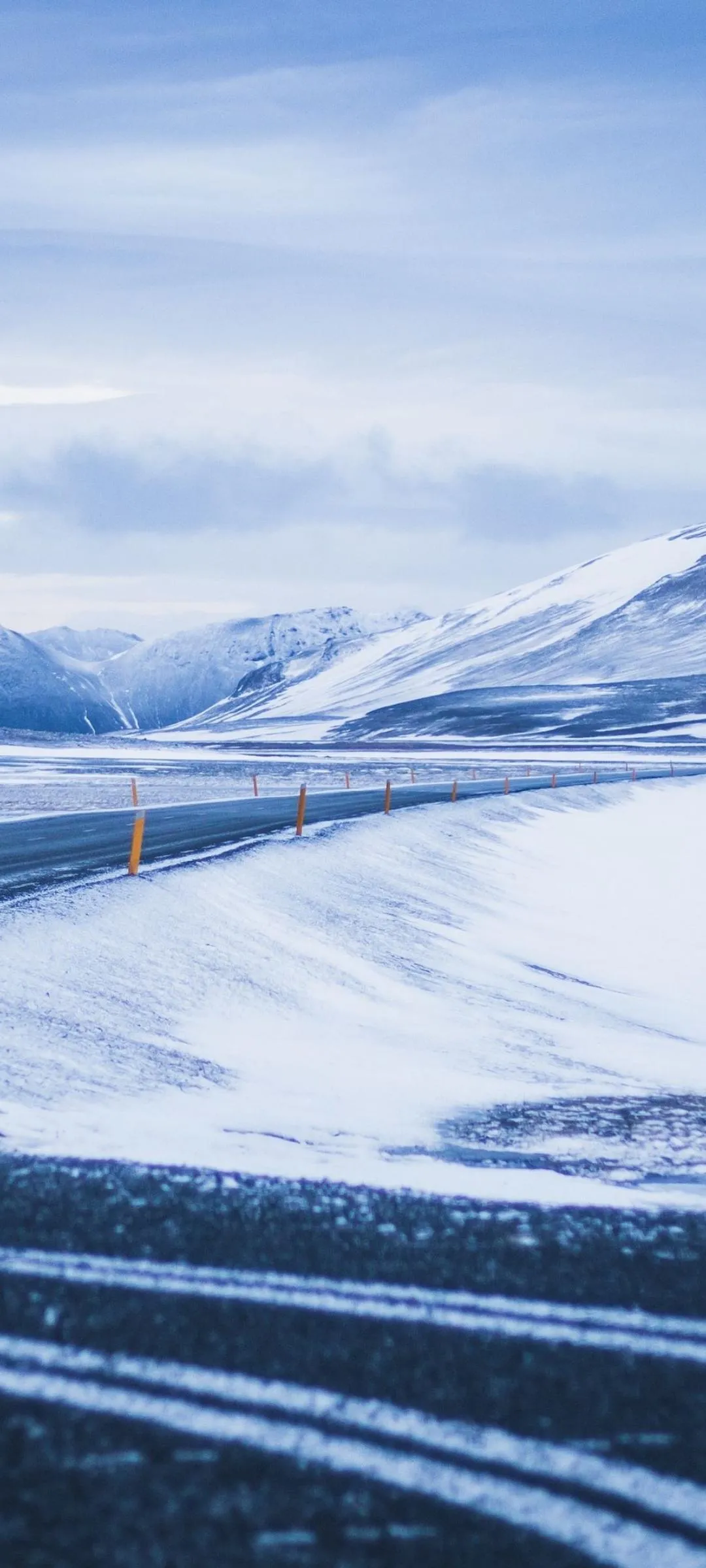 Snowy Landscape with Mountains and Smooth Road image