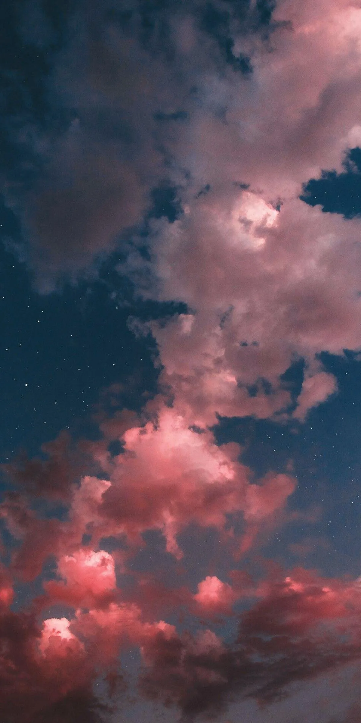Soft Cotton Clouds Glowing In Warm Evening Sunlight