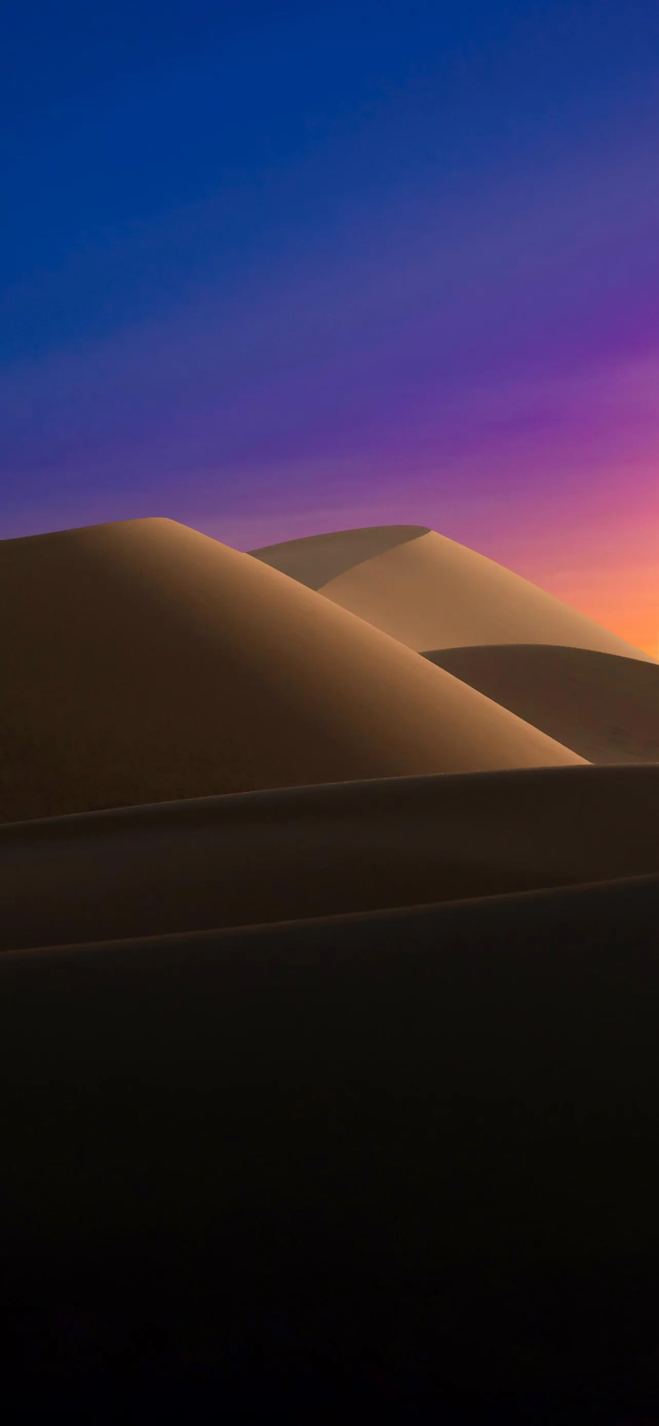 Soft Light Over Desert Dunes During Evening Sunset