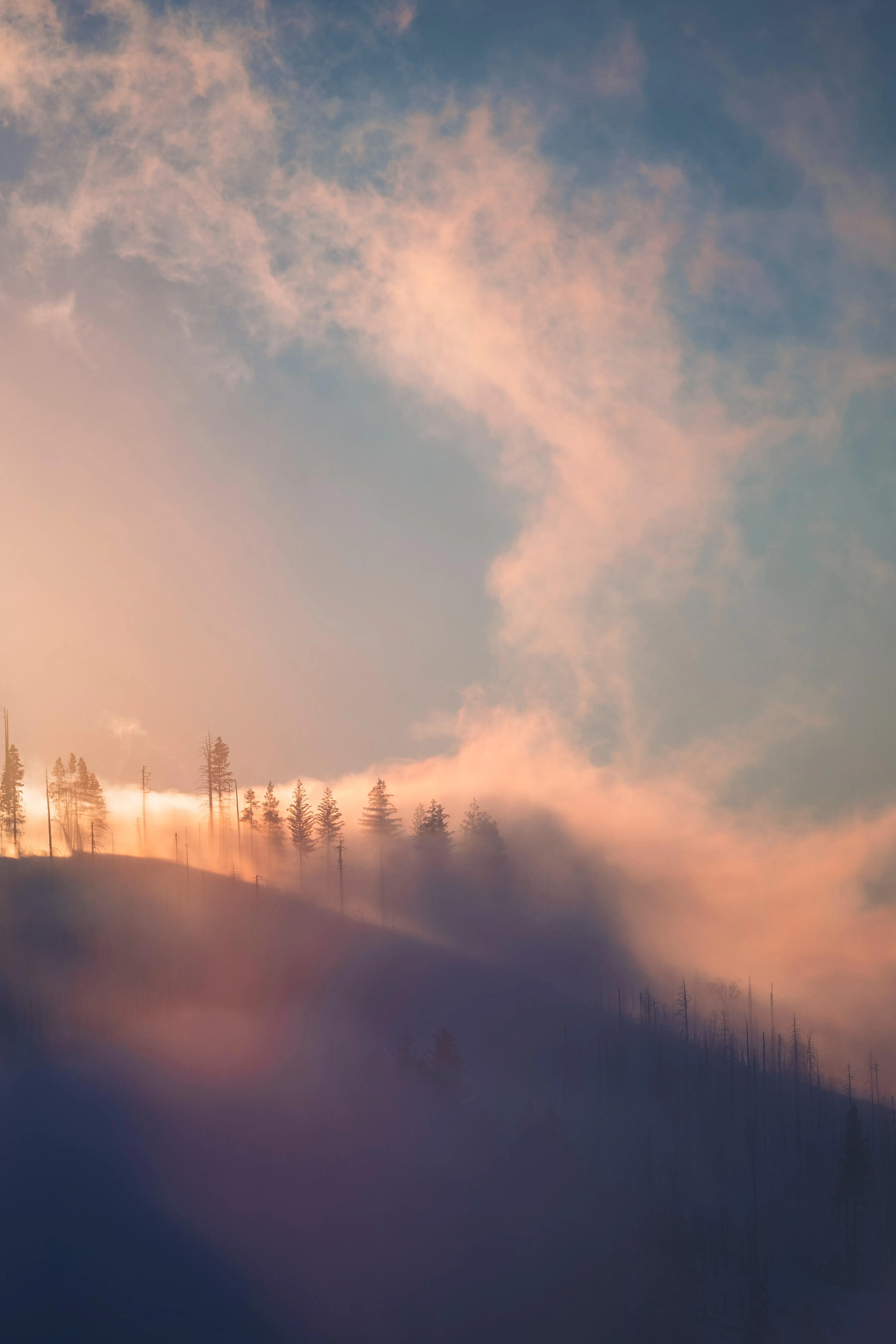 Soft Sunrise Light Drifting Across Quiet City Skyline