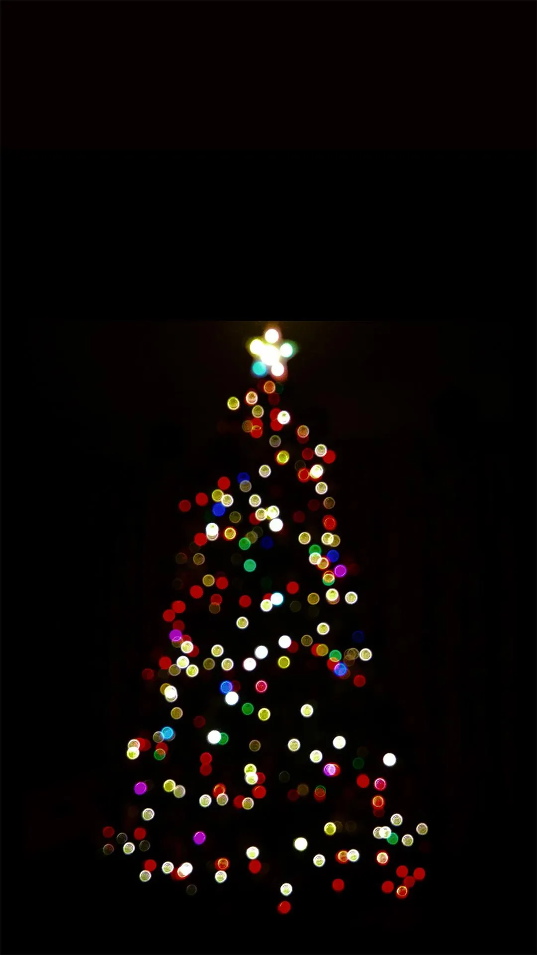 Sparkling Christmas Tree Glowing in the Dark Wallpaper