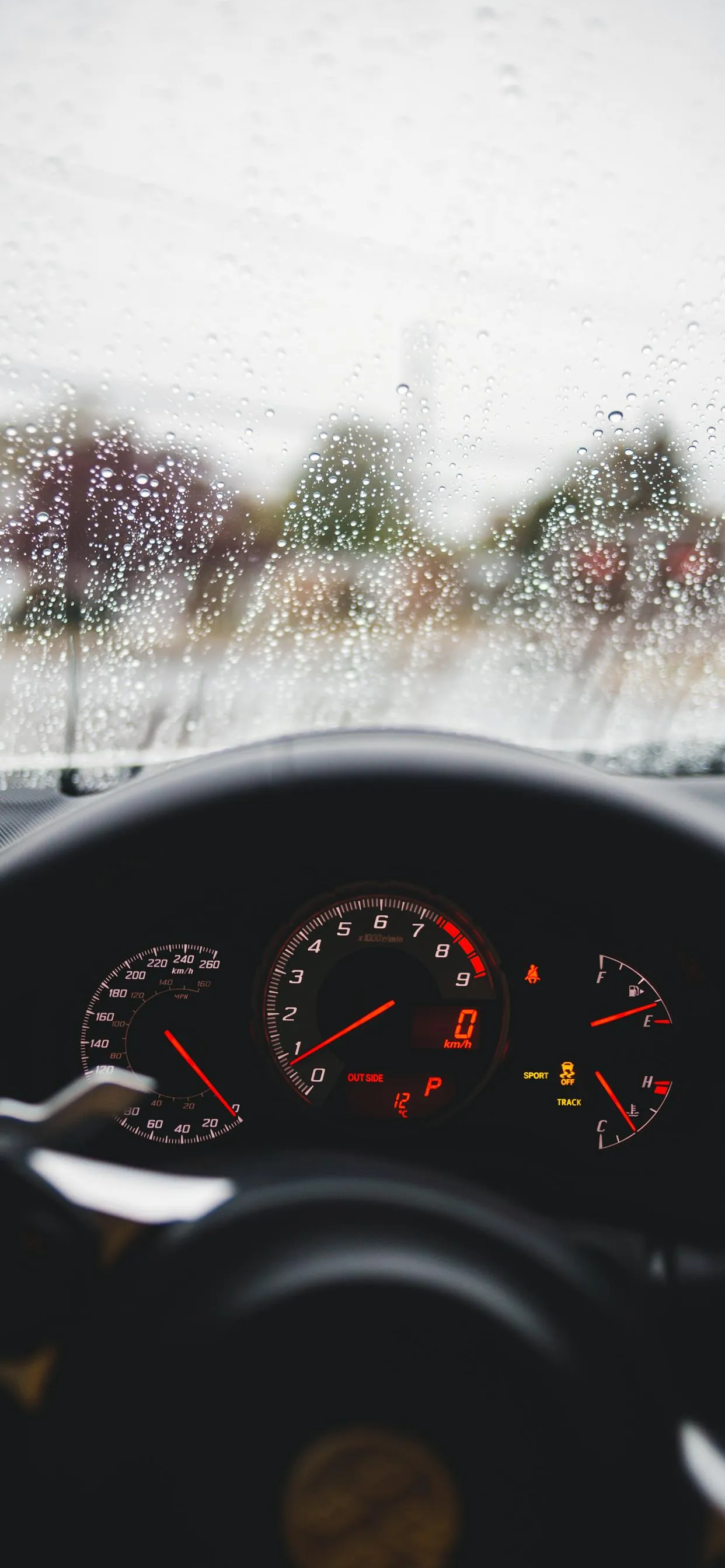 Speedometer Close Up with Water Droplets and Speed Blur