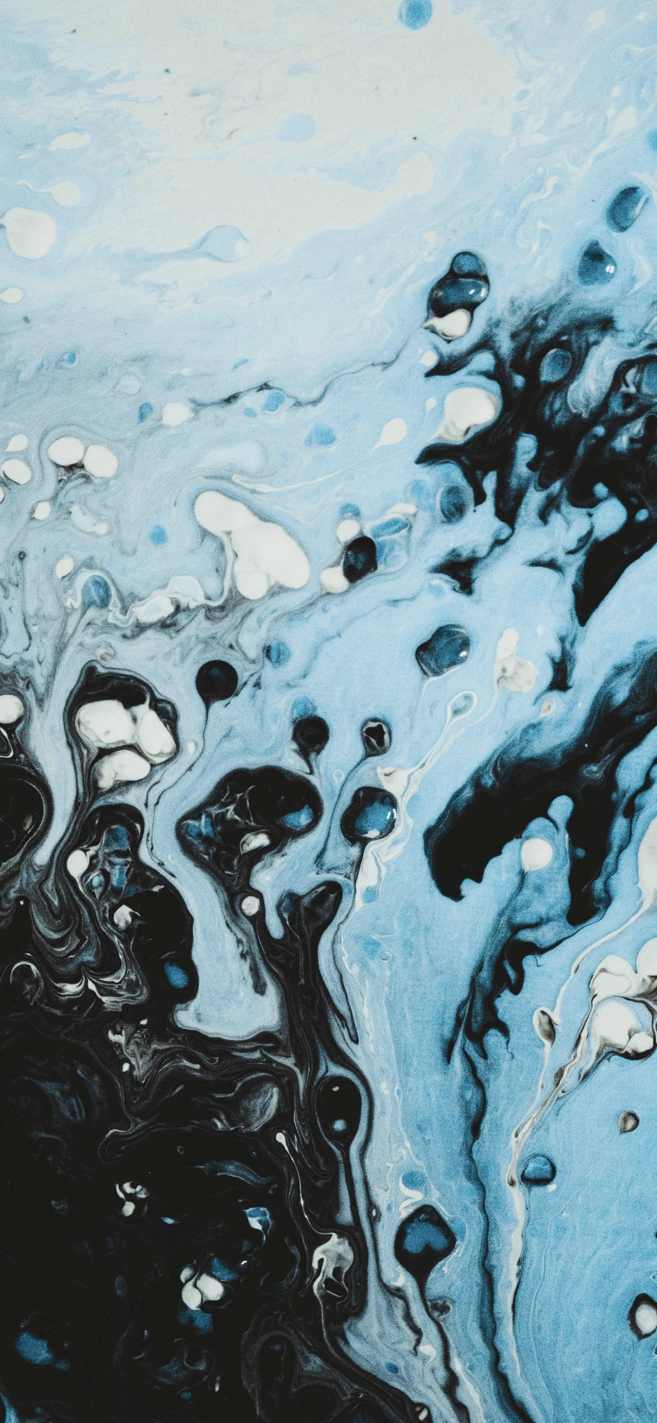 Splash of Water Captured in Abstract Blue and White Motion