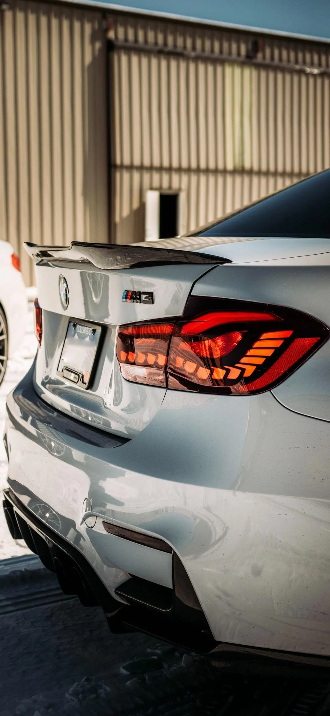 Sports Car Backside in Stylish Indoor Garage Shot Wallpaper