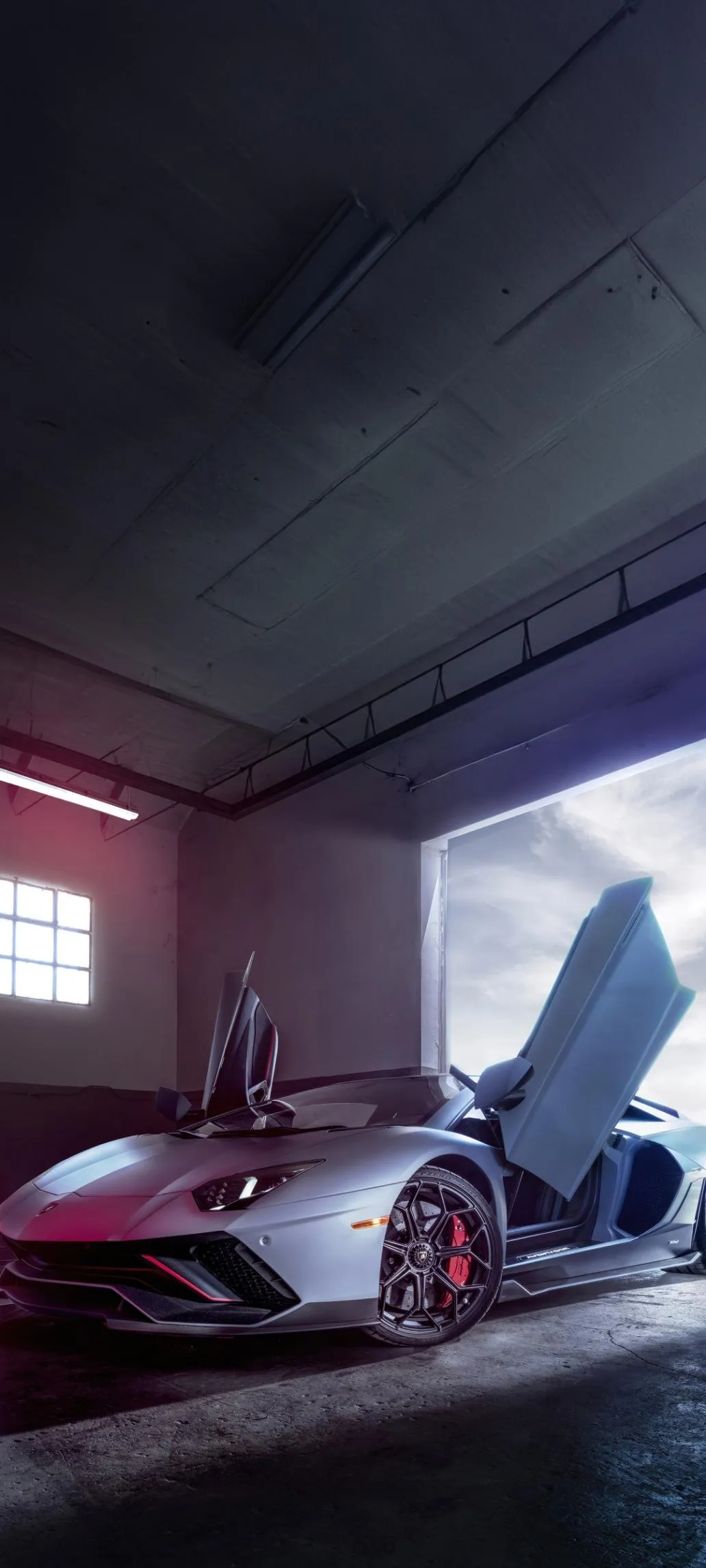 Sports Car Inside Modern Garage with Neon Lights Wallpaper