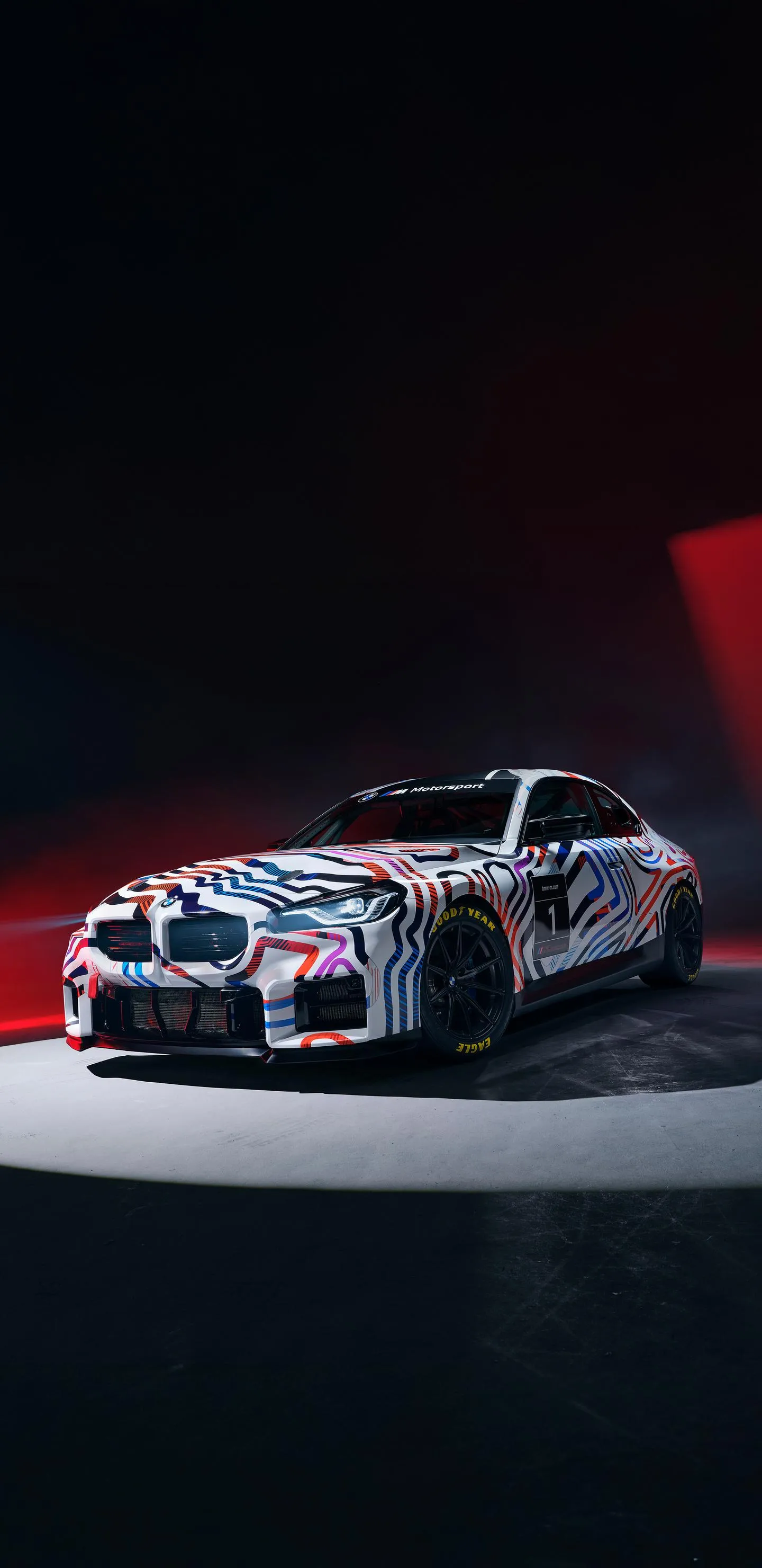 Sports Car with Red Lighting in Dark Road Setup Wallpaper