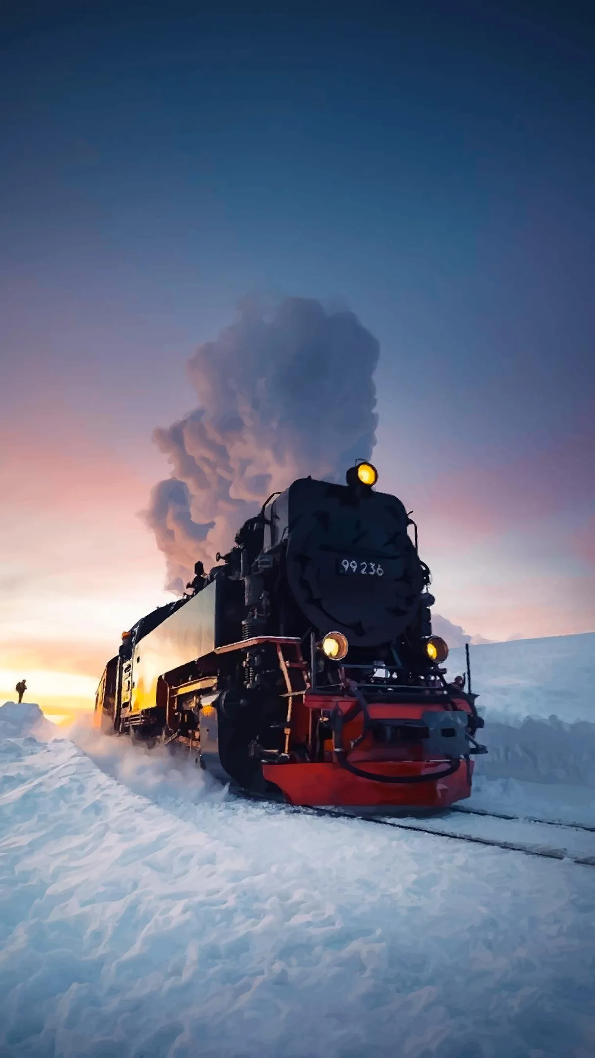 Steam Train Traveling through a Snowy Landscape Wallpaper
