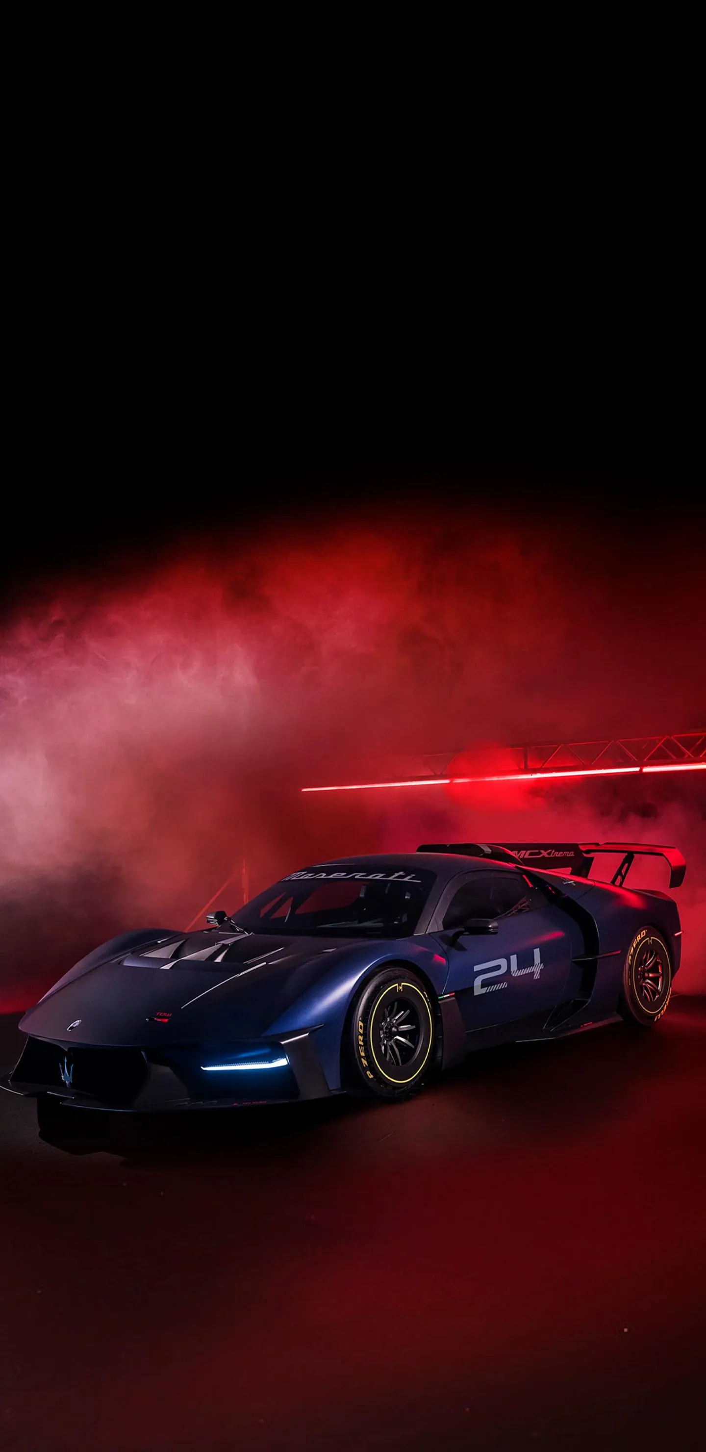 Stunning Red Sports Car in Dark Smoky Background Wallpaper