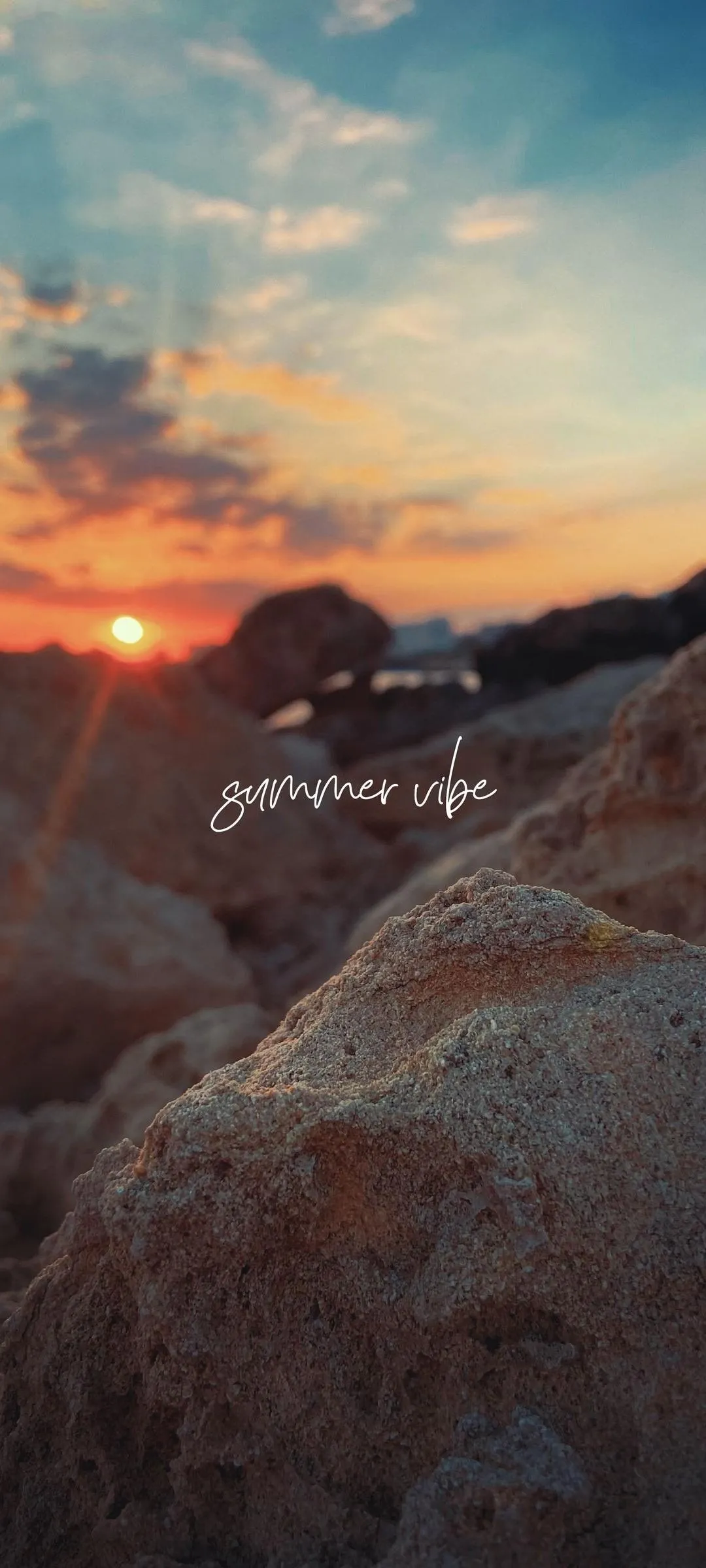 Stunning Sunset Over Rocky Landscape Mobile Wallpaper