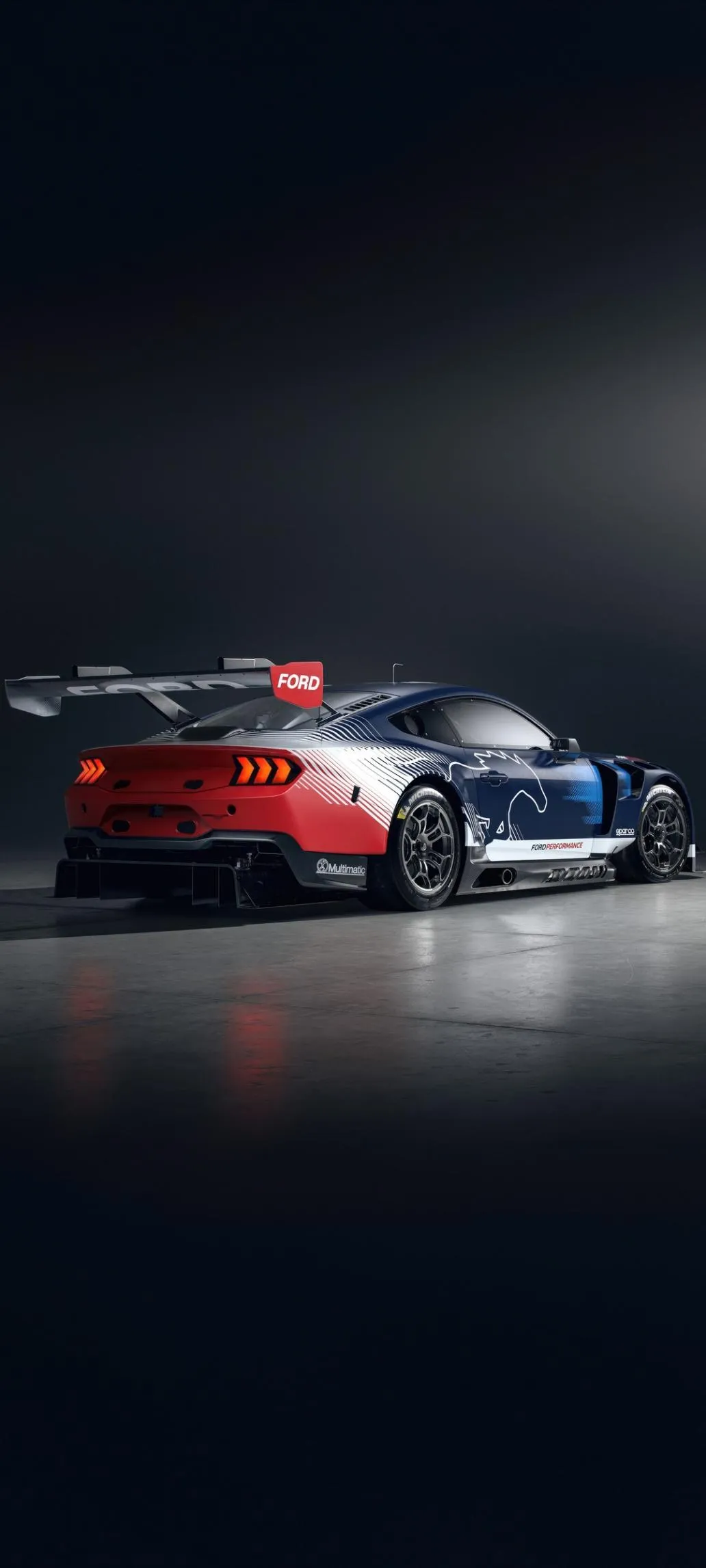 Stylish Sport Car in Dark Street Racing Mobile Wallpaper