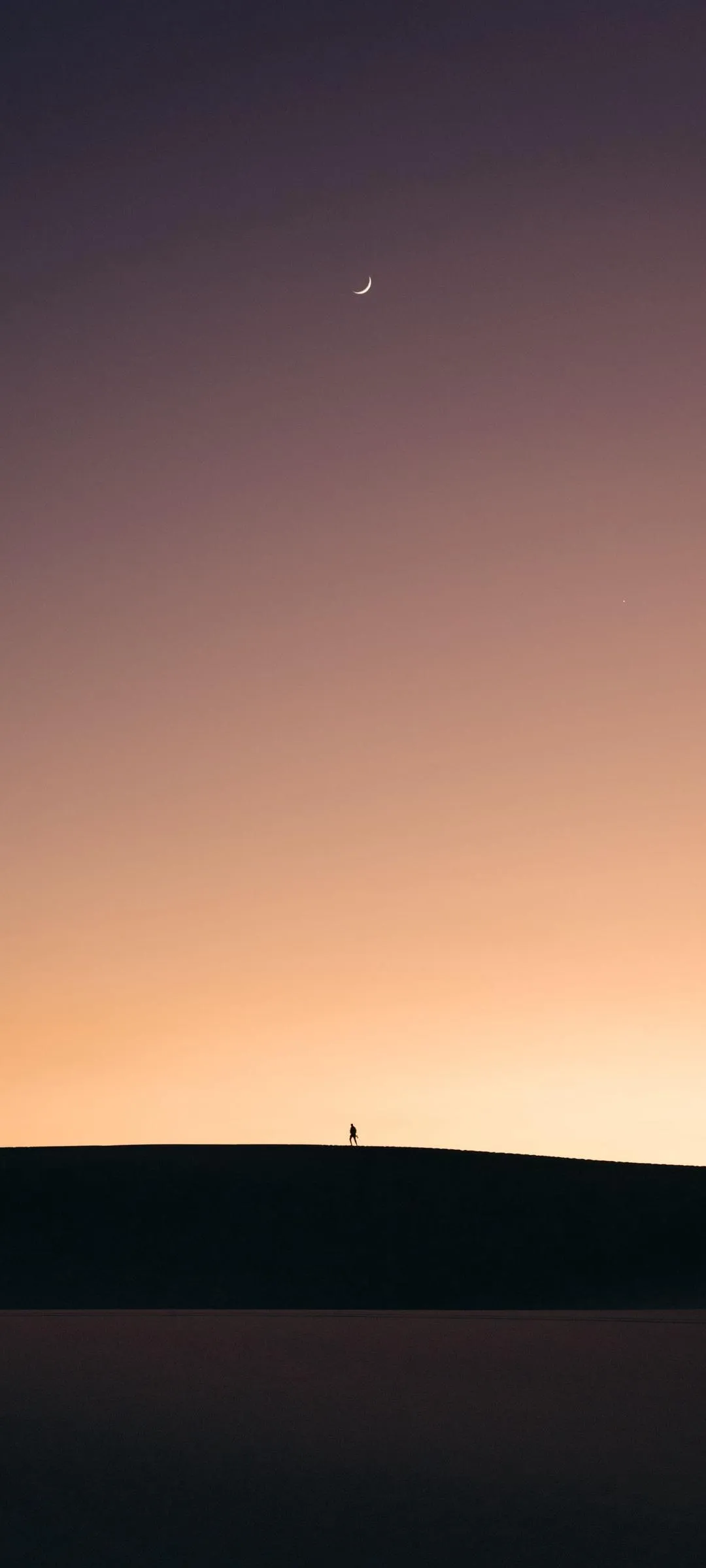 Sunset Horizon Casting Gentle Colors Over Landscape