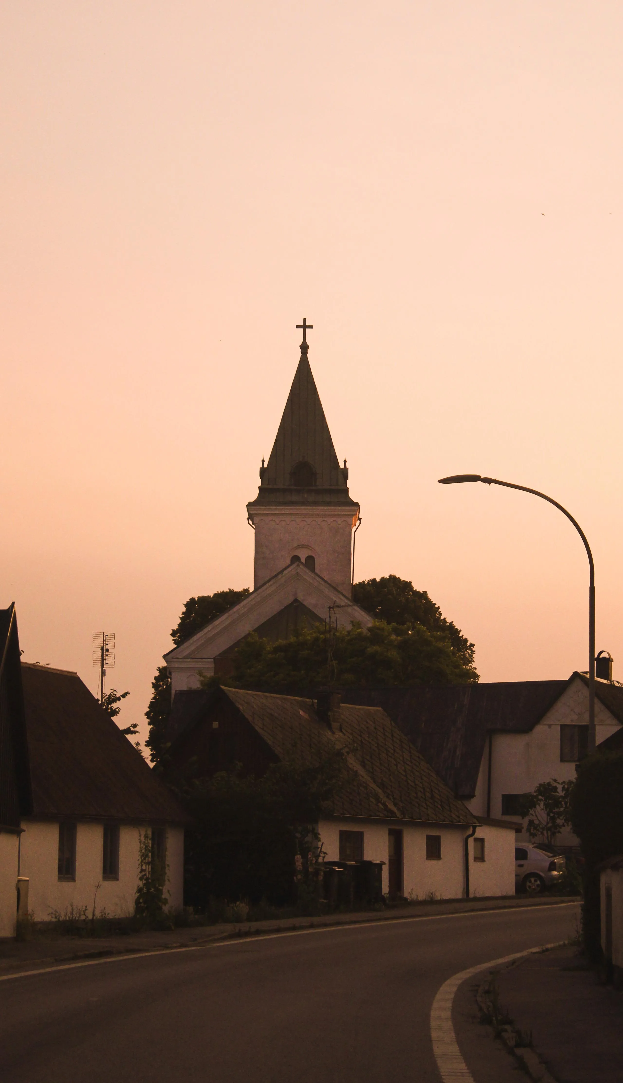 Sunset Over Old Town Church Captured with Warm Tones