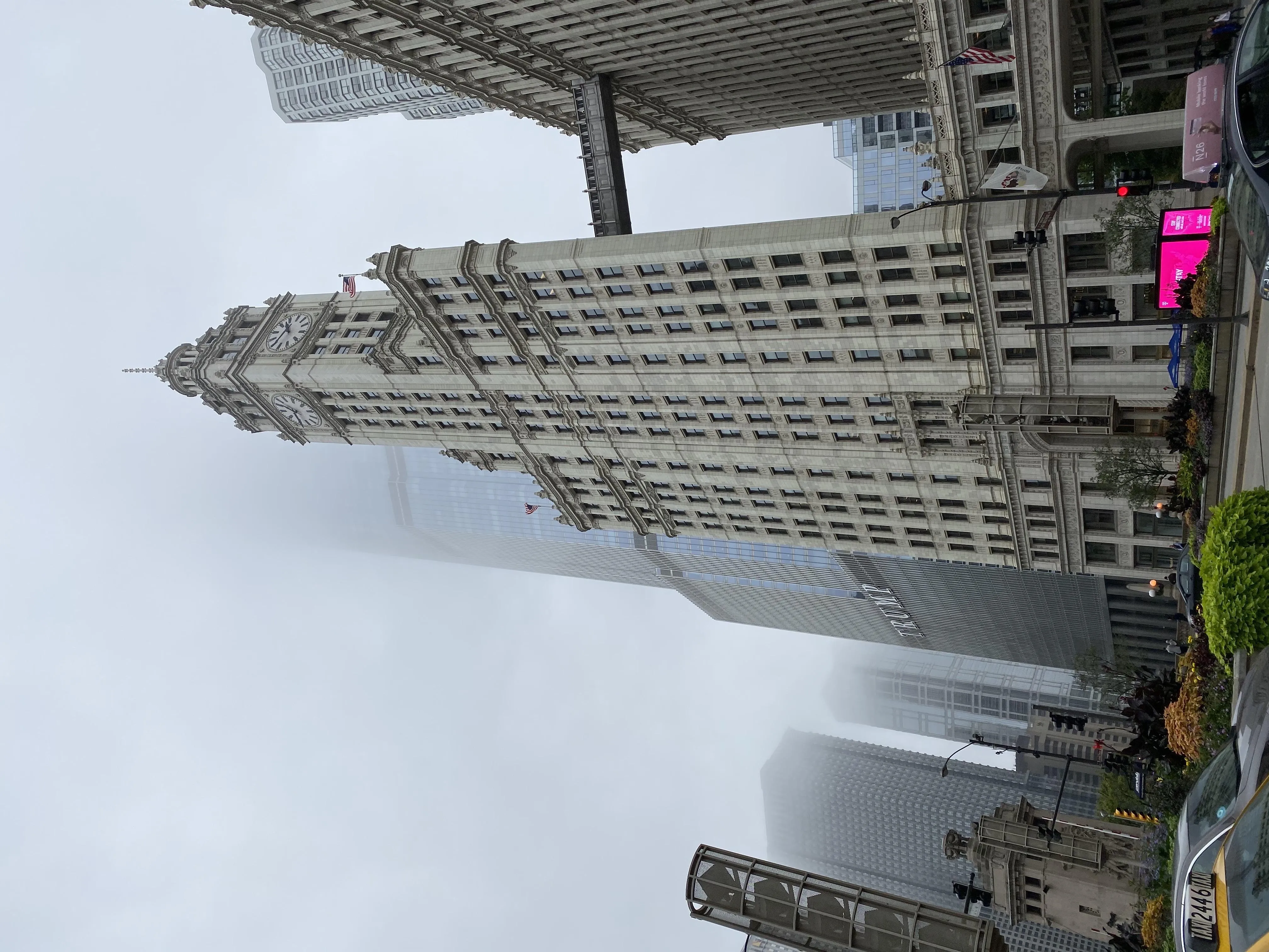 Tall Modern Skyscrapers Under Cloudy Sky in Urban Cityscape