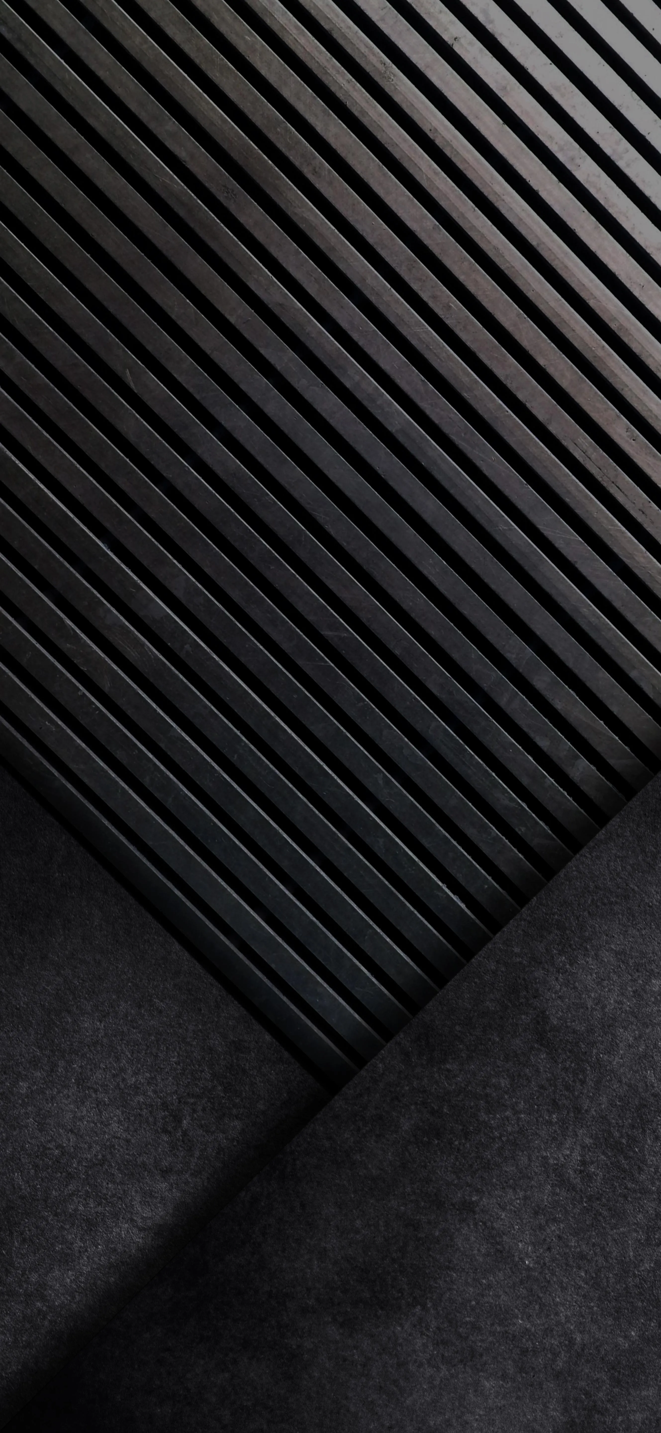 Textured Black Diagonal Stripes on Dark Background