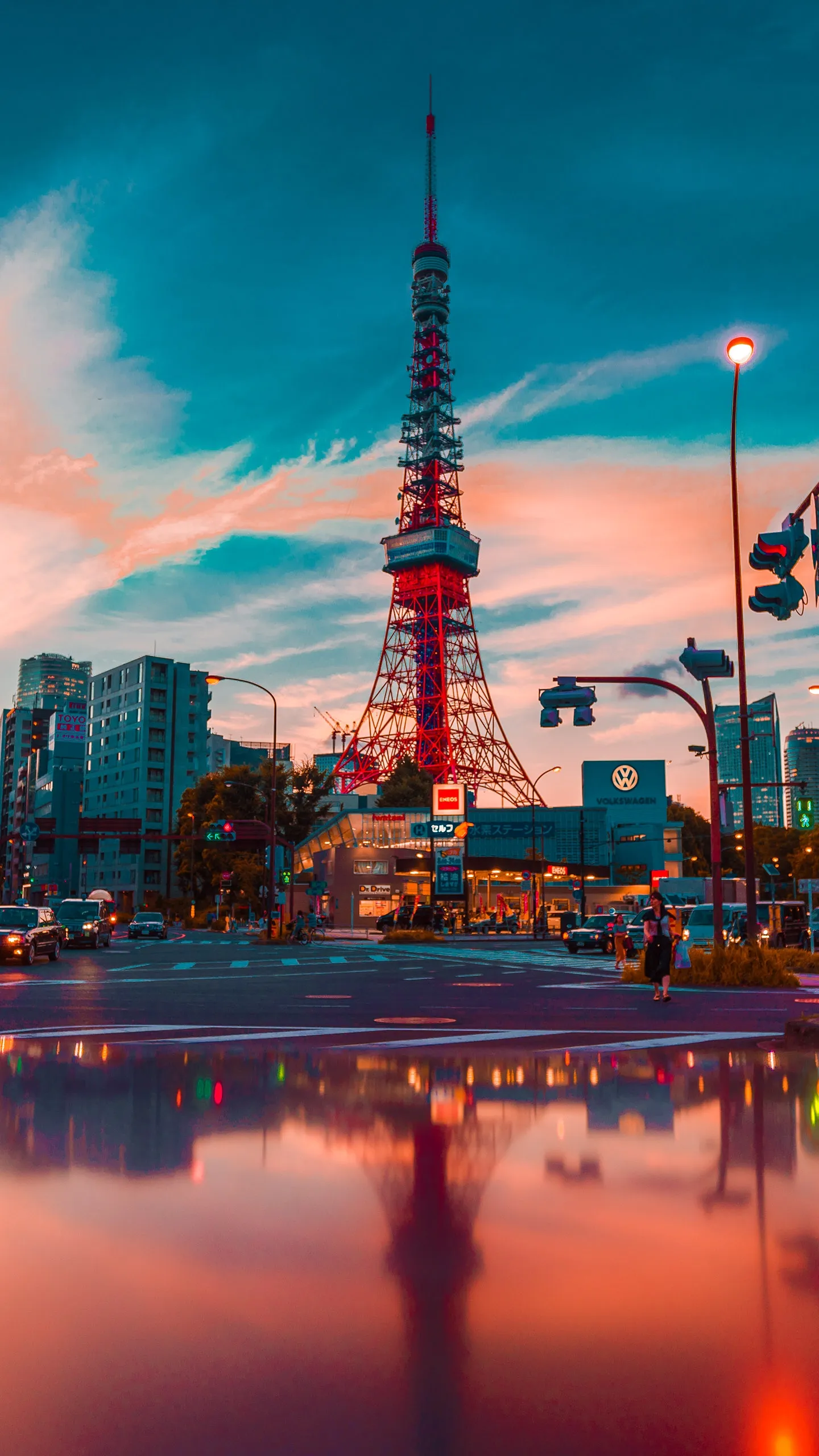 Tokyo Tower Reflected in Calm Water at Vibrant Sunset