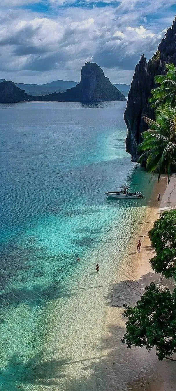 Tropical Beach View with Turquoise Ocean Scene Wallpaper