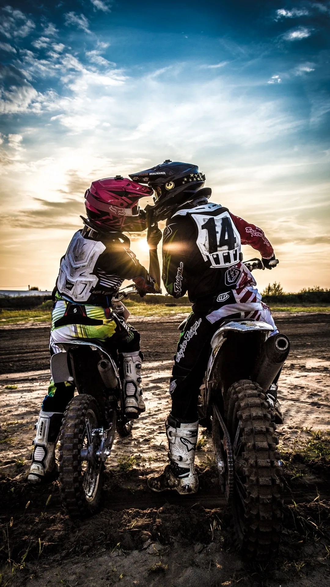Two Bikers Sharing a Moment in Golden Sunset Light Image