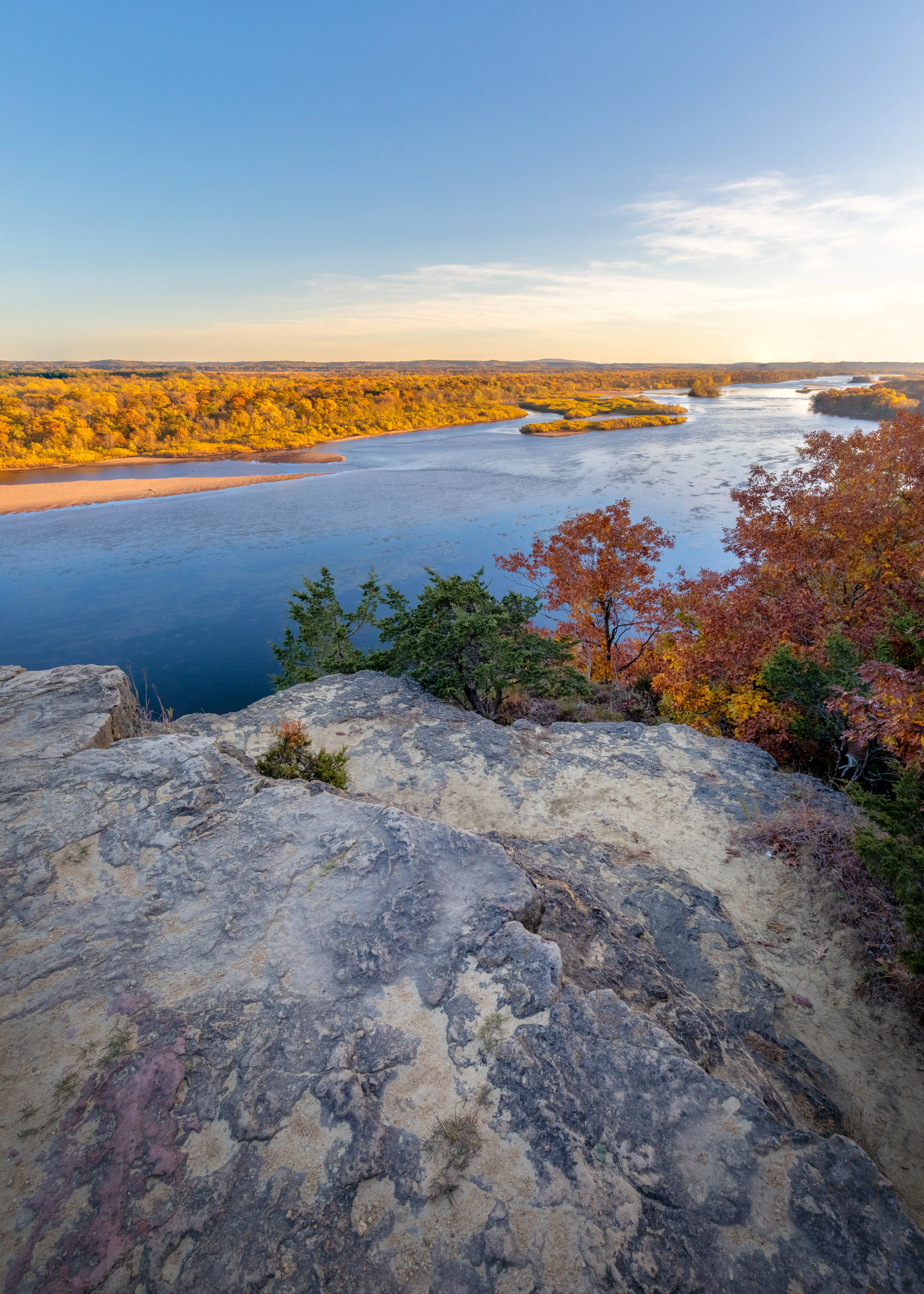 Vast Lake View from Rocky Hill at Sunset Wallpaper