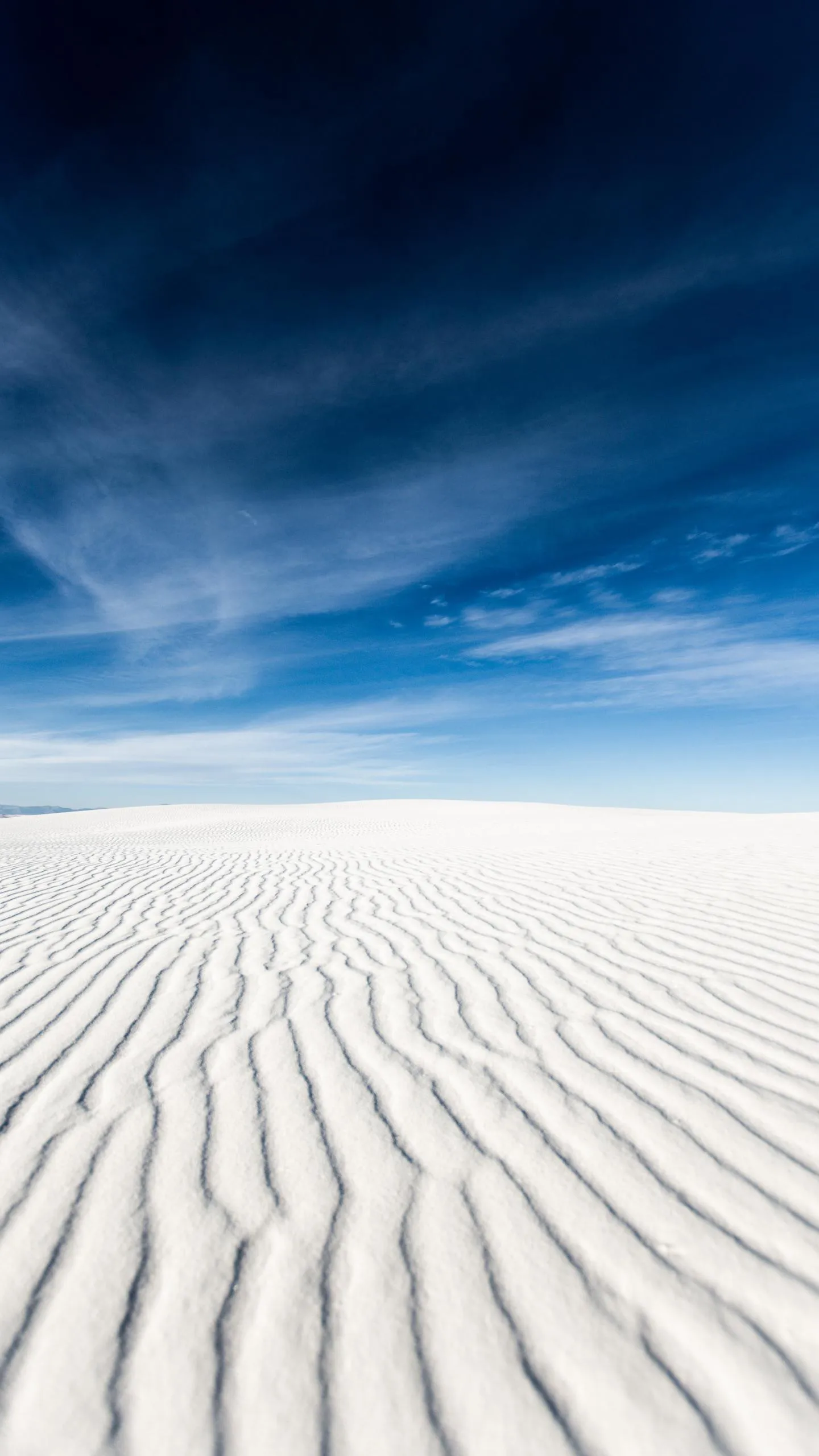 Vast White Sand Dunes Under Blue Sky Horizon Wallpaper